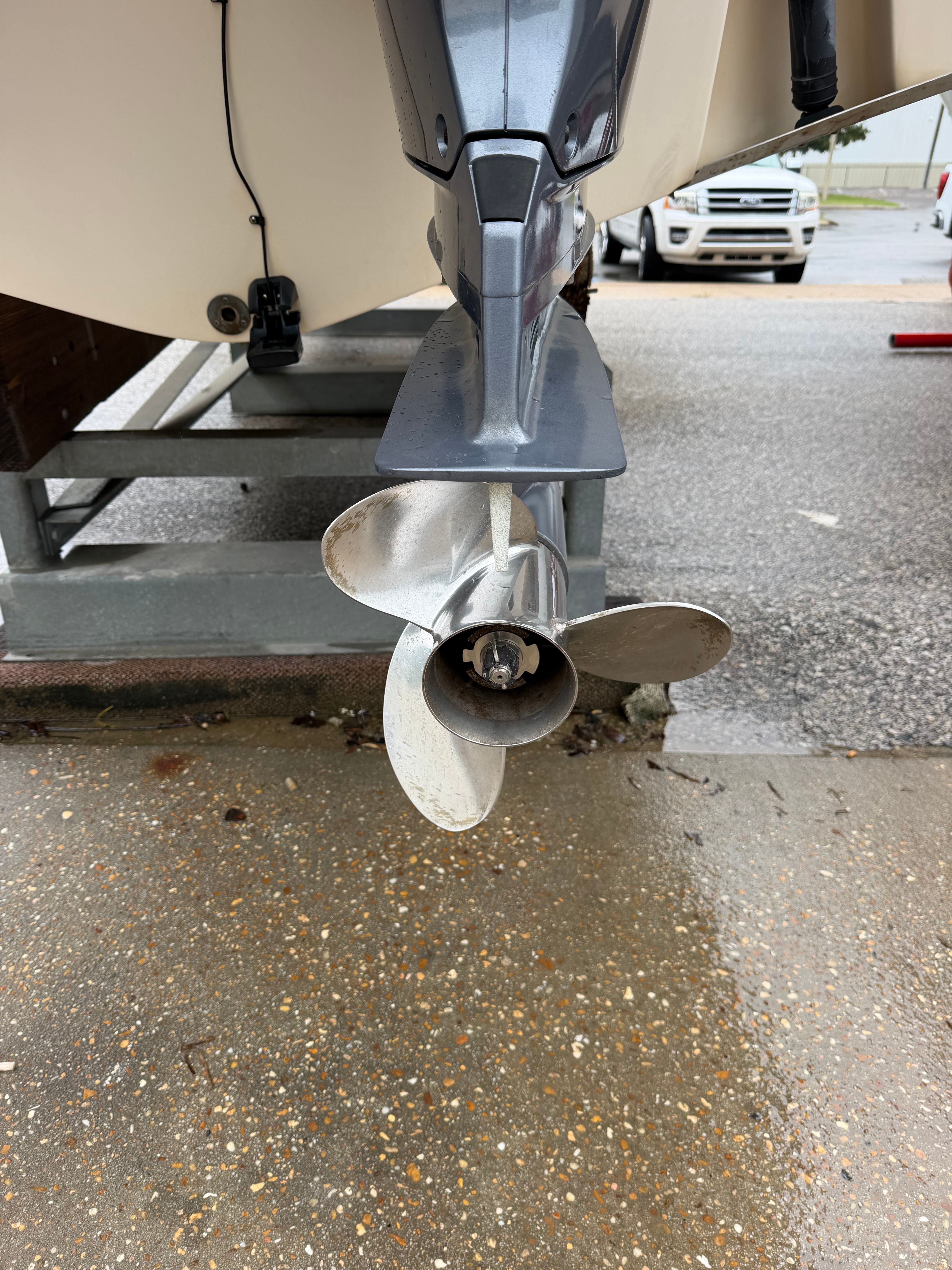 Close-up of a boat propeller on a trailer.