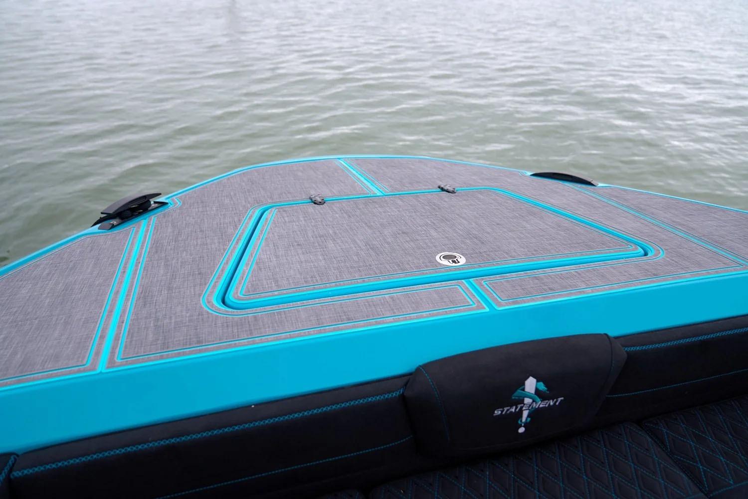 Manufacturer Provided Image: Bow of 2025 Statement 430 Tigress boat with sleek design on calm water.