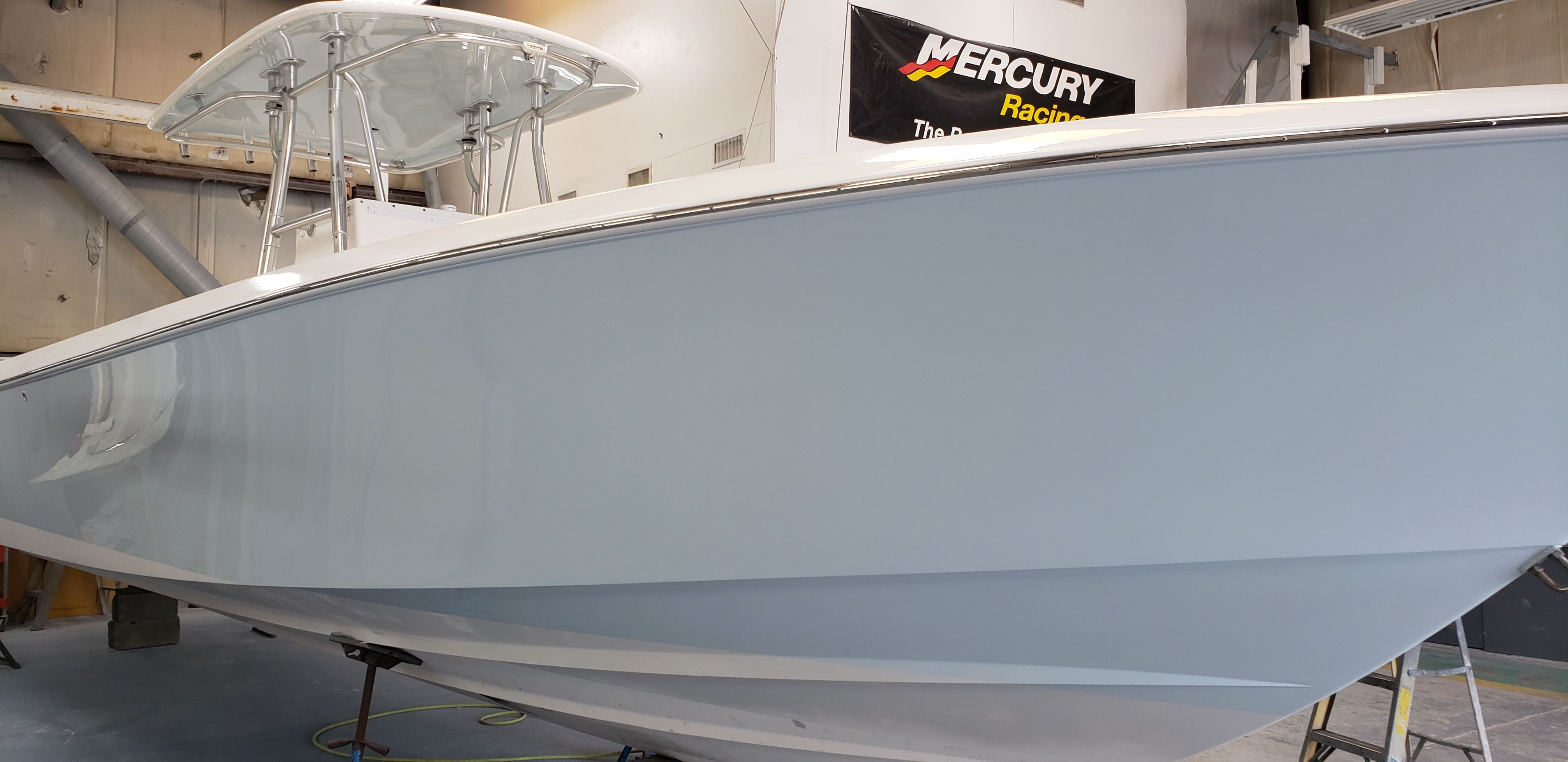 2009 Contender 33 Tournament boat in a workshop.
