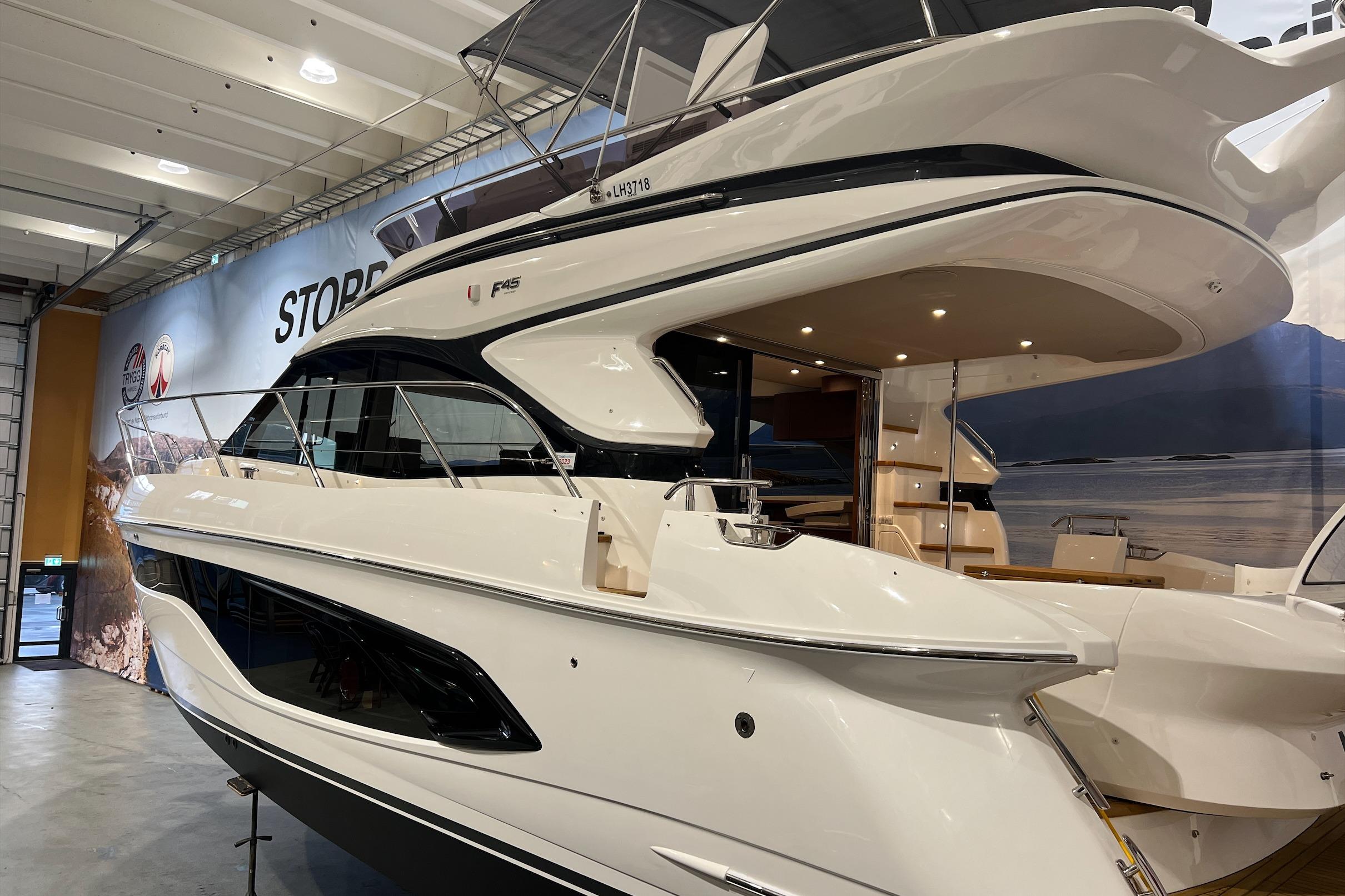 2019 Princess F45 yacht displayed indoors, showcasing sleek design and luxury features.