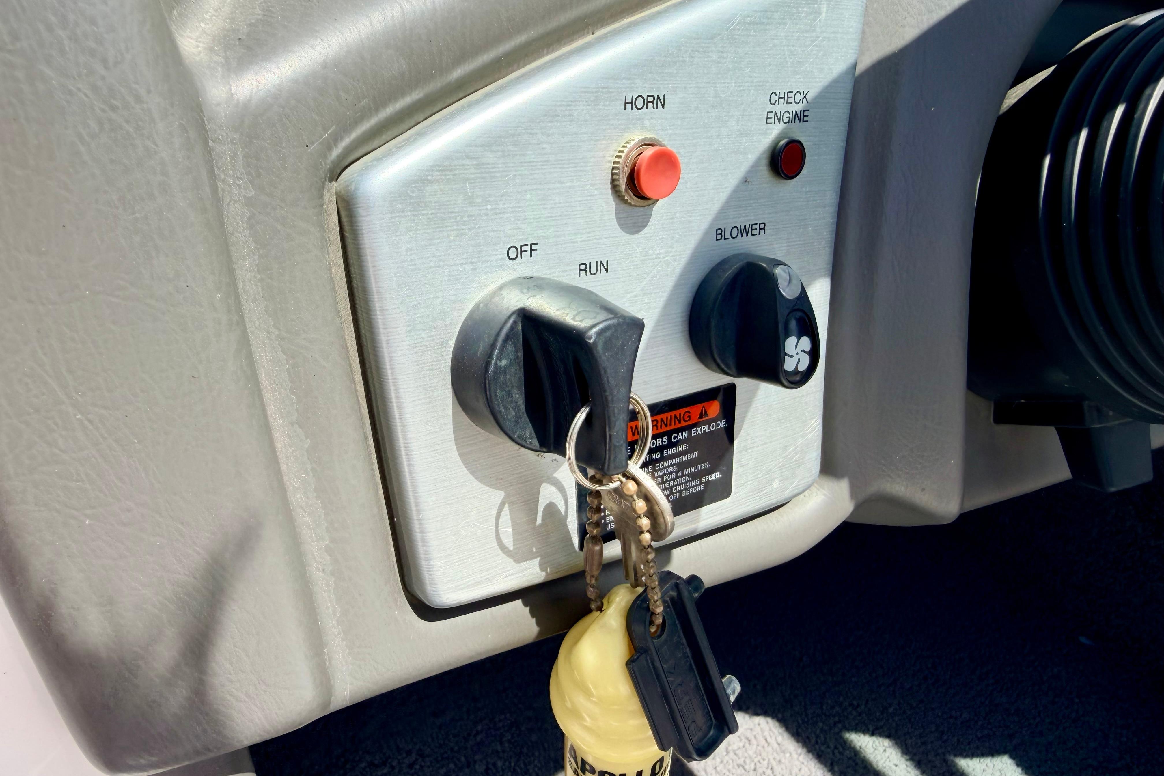 2008 Moomba Outback V ignition panel with keys, horn, and blower controls.