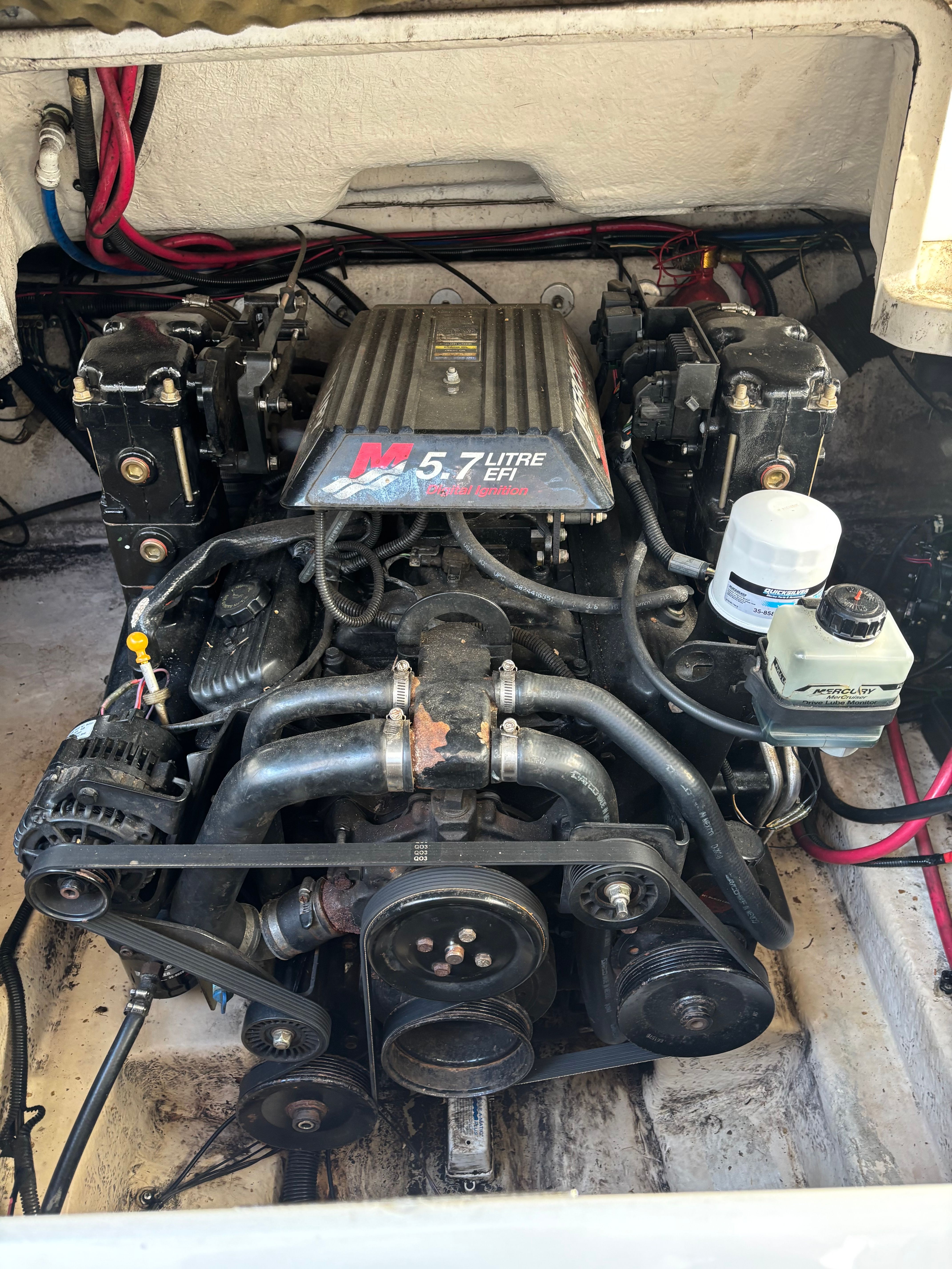 Engine of a 2001 Sea Ray 245 Weekender boat.
