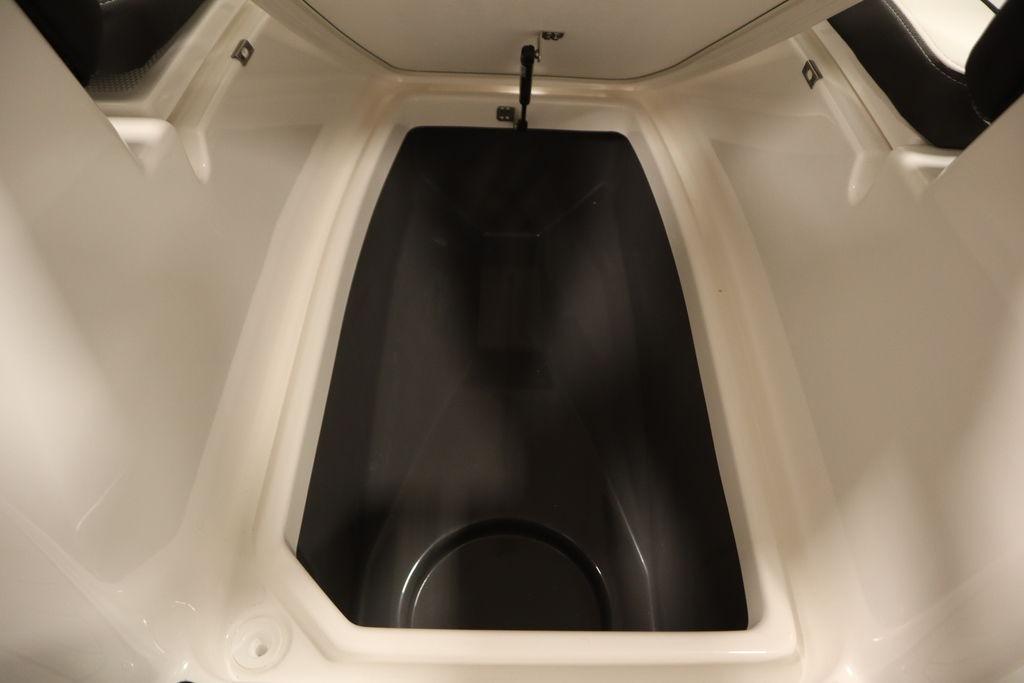 Interior storage compartment of 2026 Yamaha Boats 255 FSH Sport E.