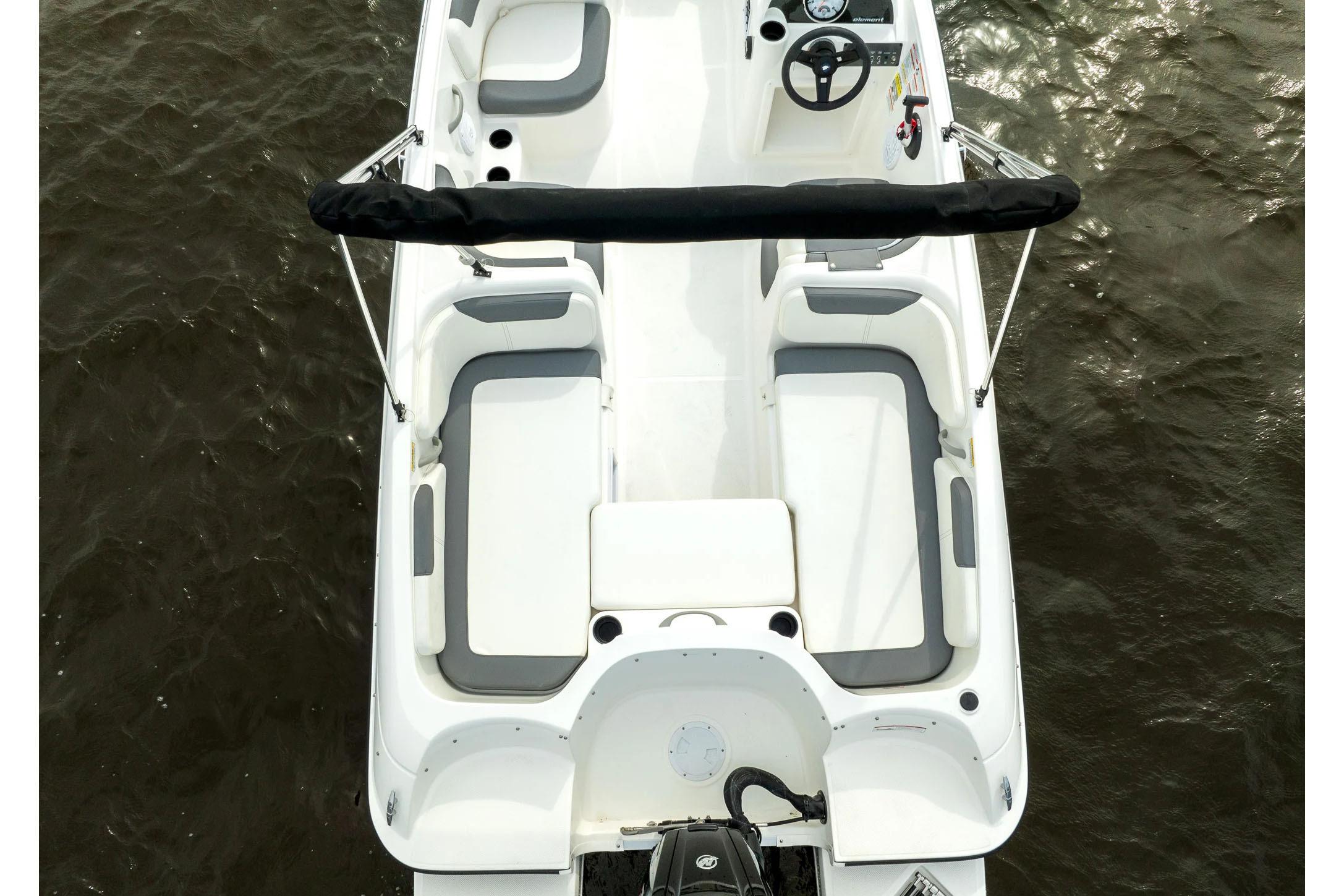 Manufacturer Provided Image: 2025 Bayliner Element E18 boat, aerial view, white and gray seating, on water.