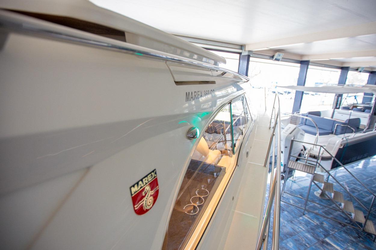 2022 Marex 360 Cabriolet Cruiser in showroom, showcasing sleek design and luxury features.