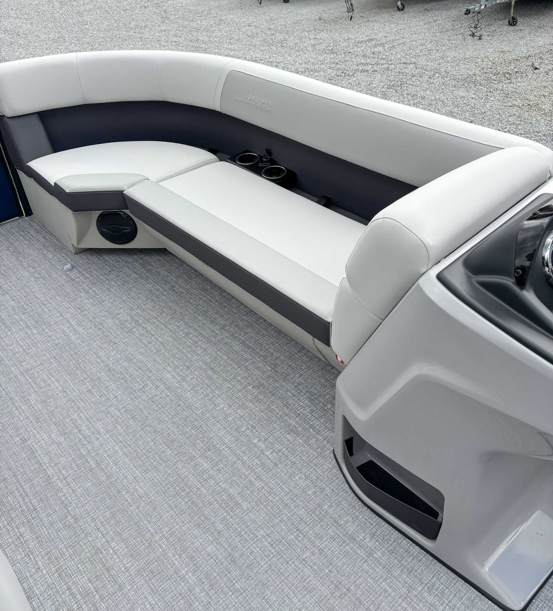Interior of 2026 Harris Cruiser 230 SLDH with gray upholstery.