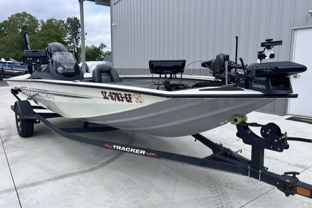 2021 Tracker Pro Team 195 TXW Tournament Edition boat on trailer, parked outdoors.