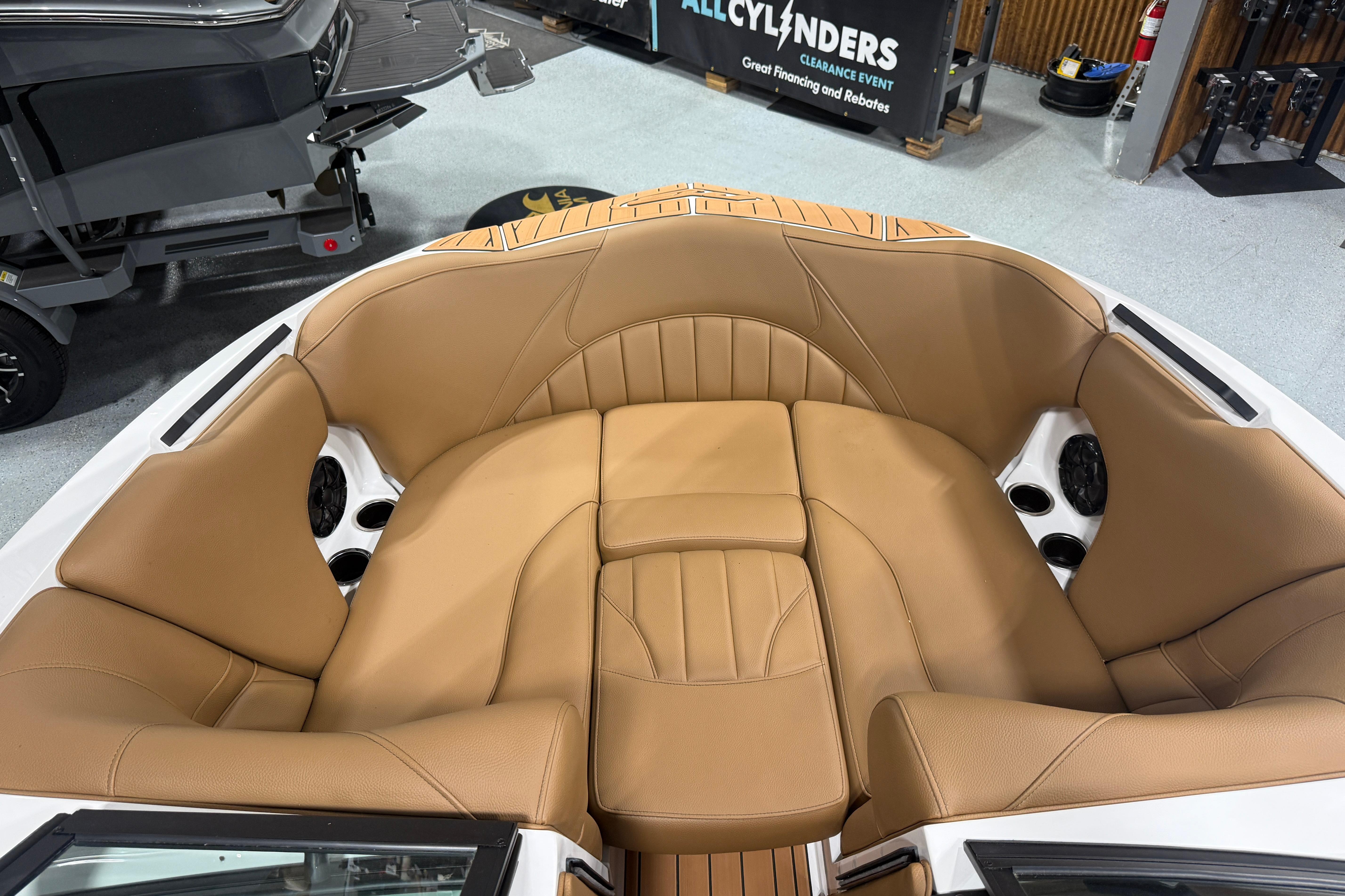 Luxurious tan leather seating in 2026 MB B52 23 Classic boat interior.