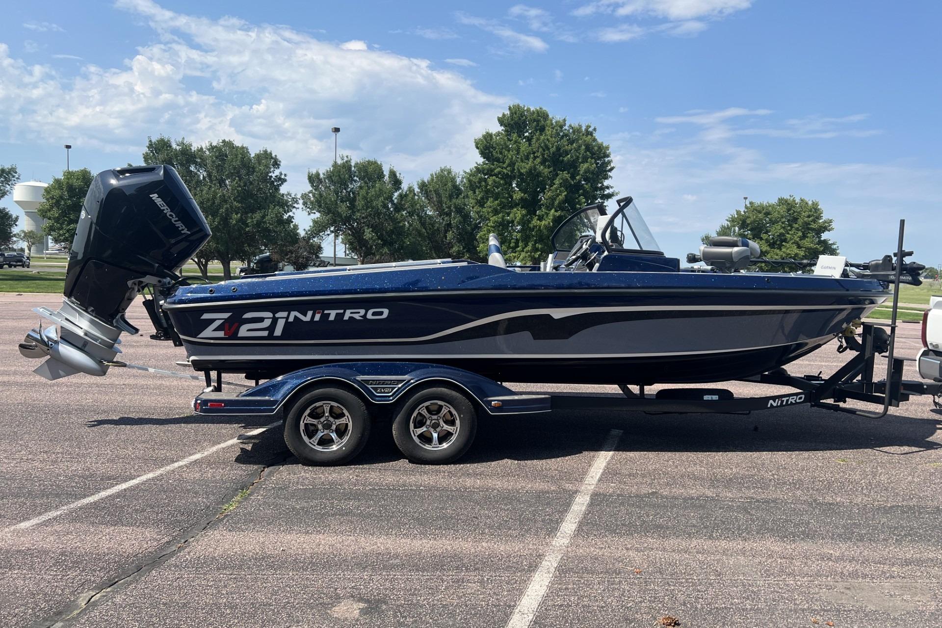 2026 Nitro ZV21 Pro boat on trailer, parked outdoors under a clear sky.