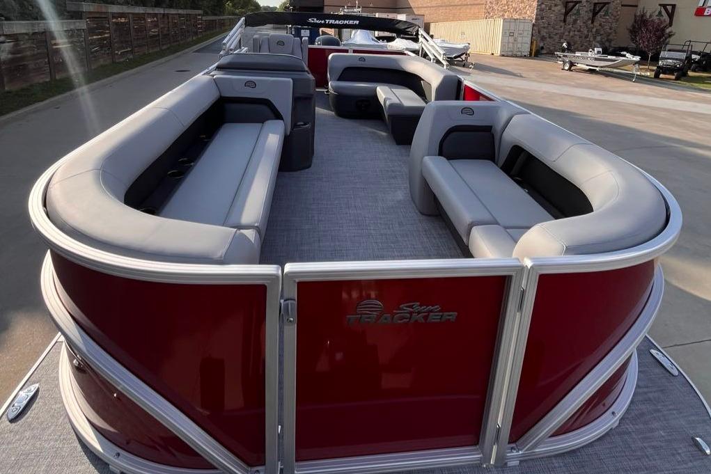 2026 Sun Tracker Party Barge 18 DLX pontoon boat with spacious seating and sleek design.