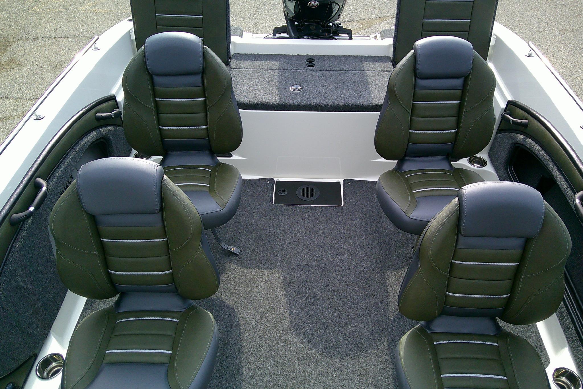 2026 Ranger 1880MS boat interior with four cushioned seats and carpeted flooring.