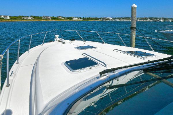 2008 Tiara Yachts 4200 Open on calm water, showcasing sleek deck design.