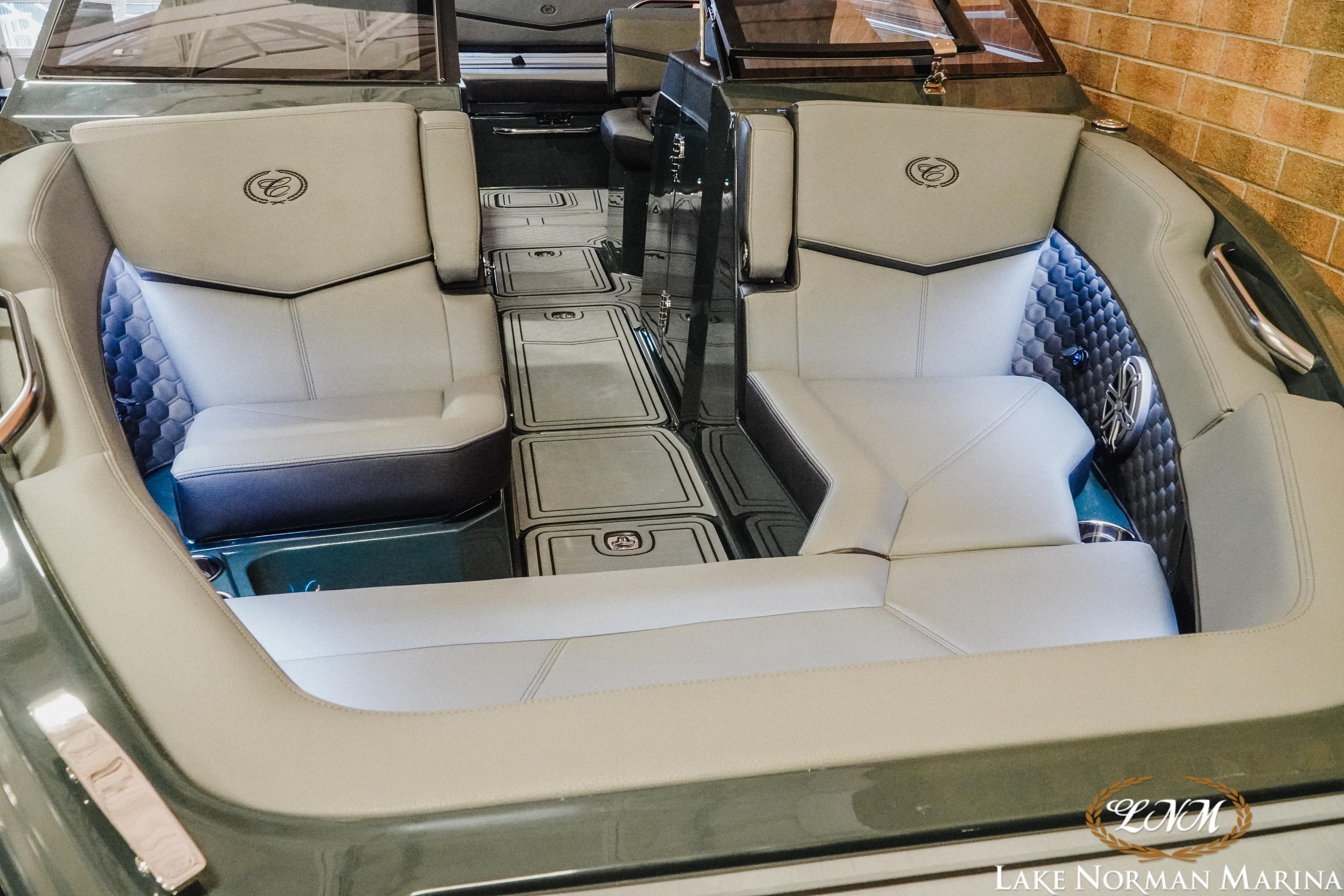 Luxurious interior of 2026 Cobalt R6 Surf boat with elegant seating and modern design.
