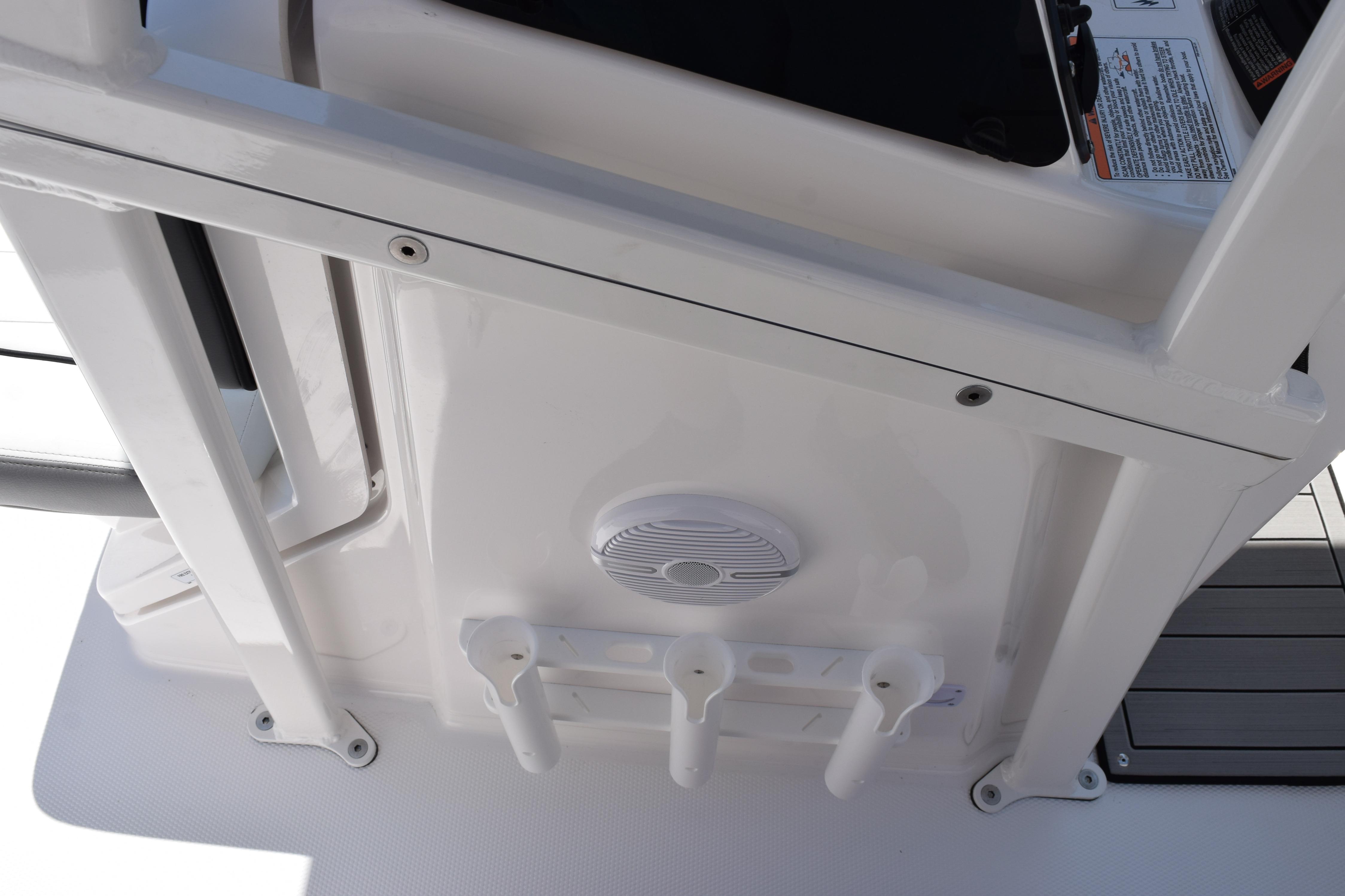 2026 Yamaha Boats 190 FSH Sport interior detail with rod holders and speaker.