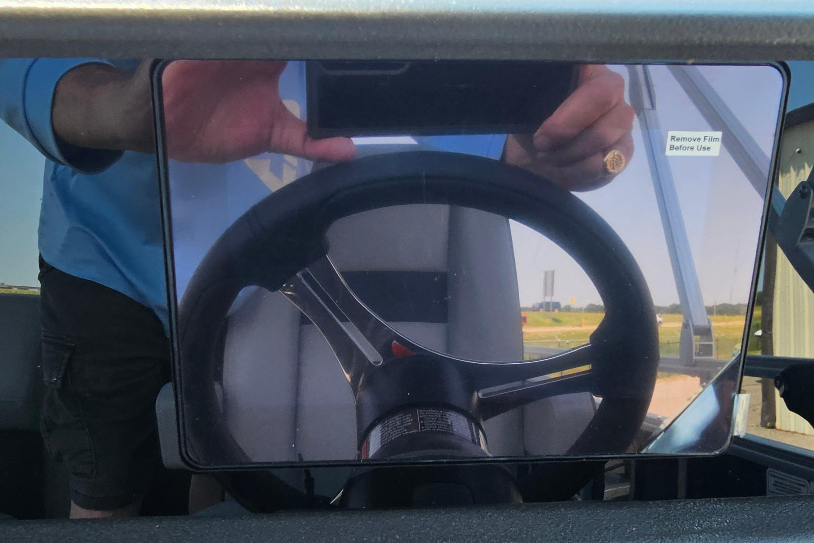 2026 Sun Tracker SportFish 20 DLX steering wheel with protective film.