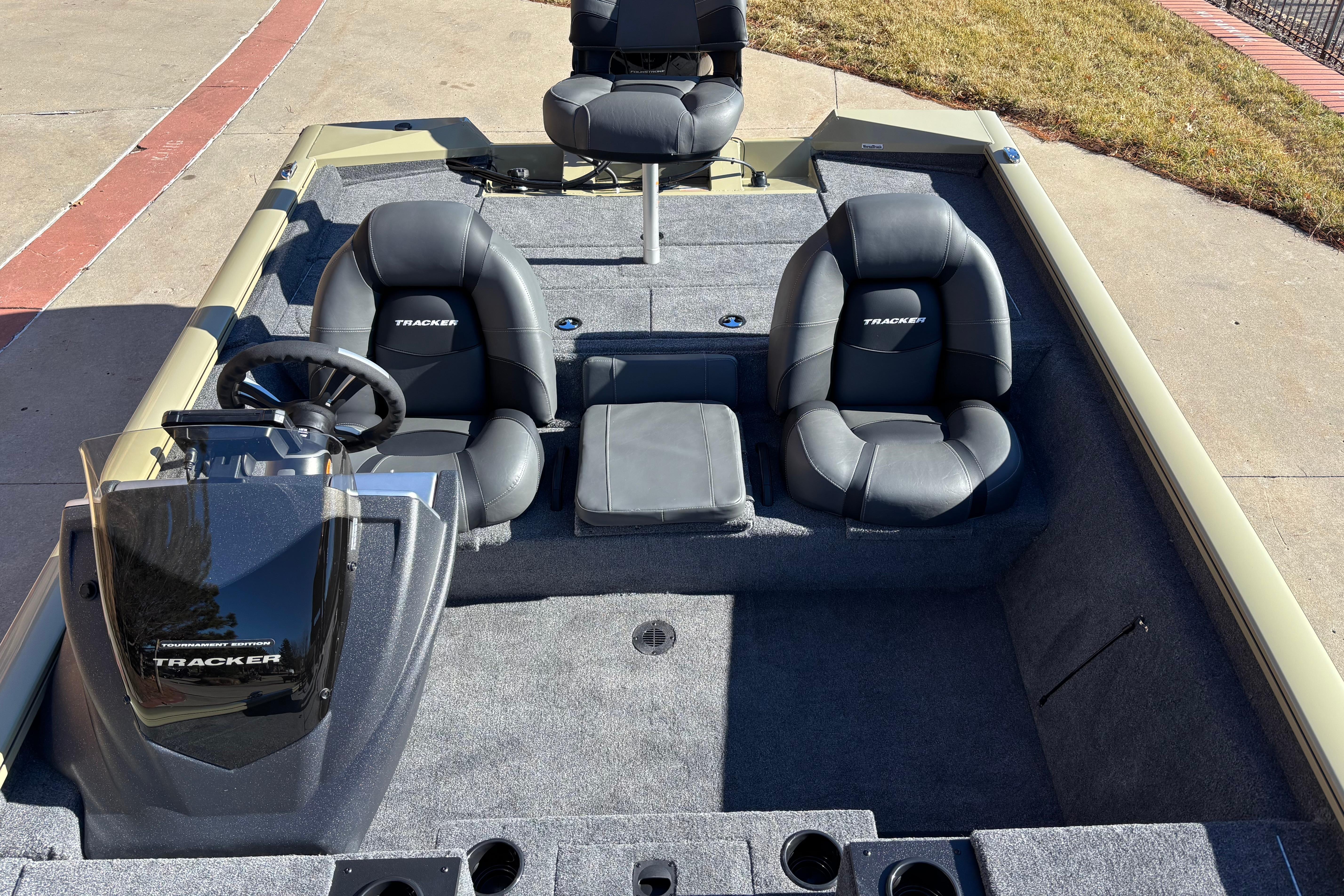 2026 Tracker Pro Team 195 boat interior with seating and steering console.