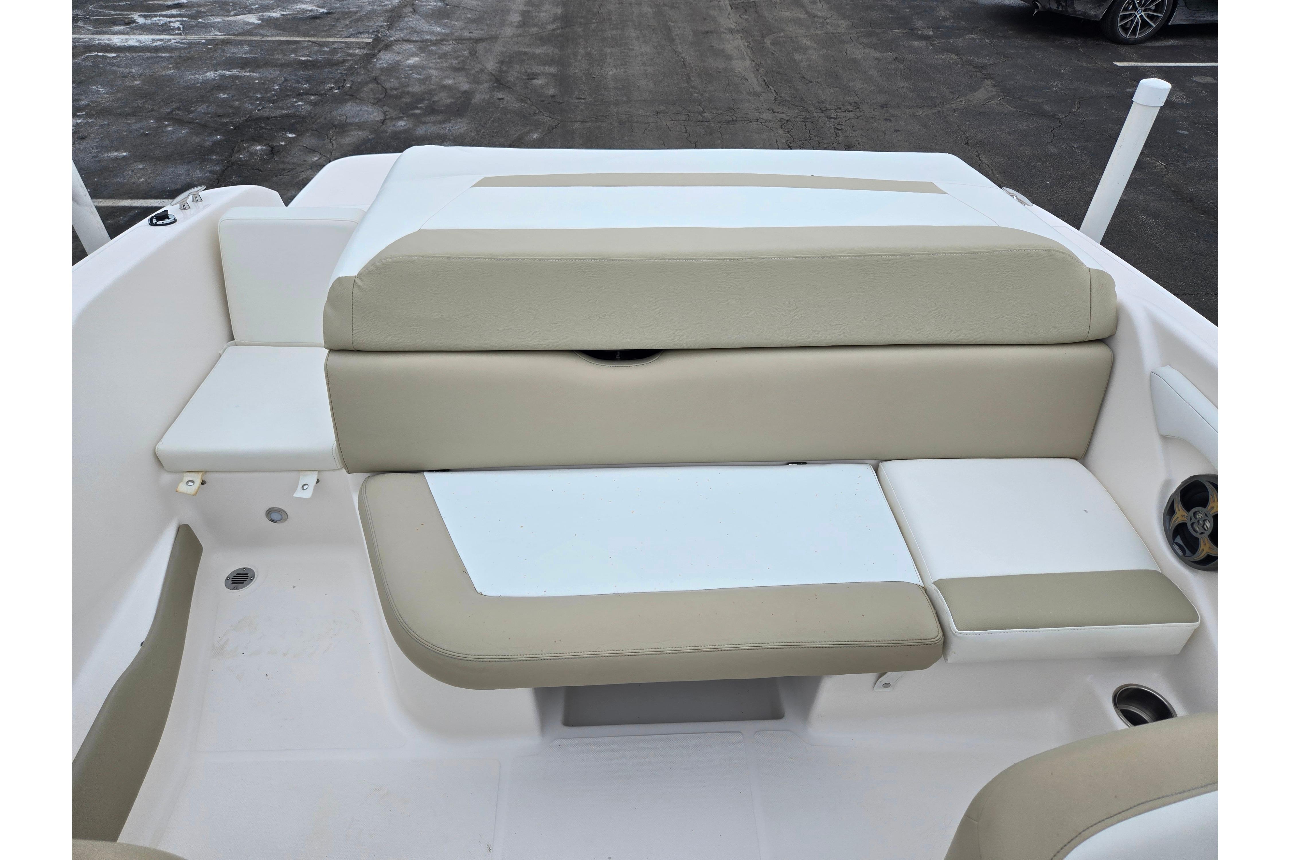 2015 Regal 1900 ES Bowrider boat interior with beige and white seating.