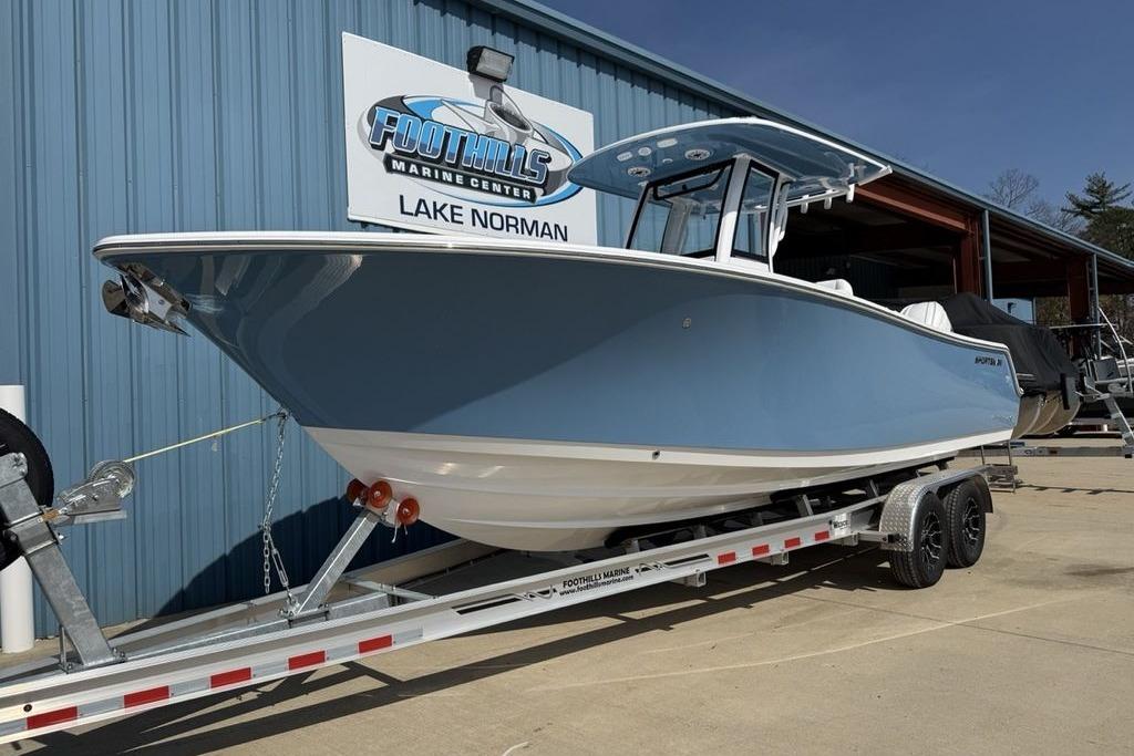 2026 Sportsman Open 252 Center Console boat on trailer at Foothills Marine Center.