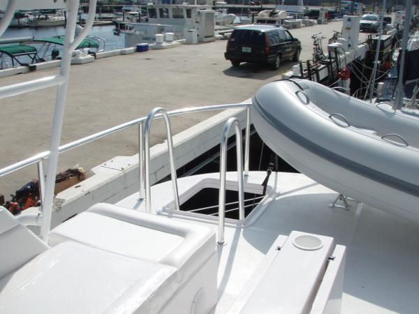 Great Harbour N40 yacht deck with inflatable boat, docked at marina, 2025 model.