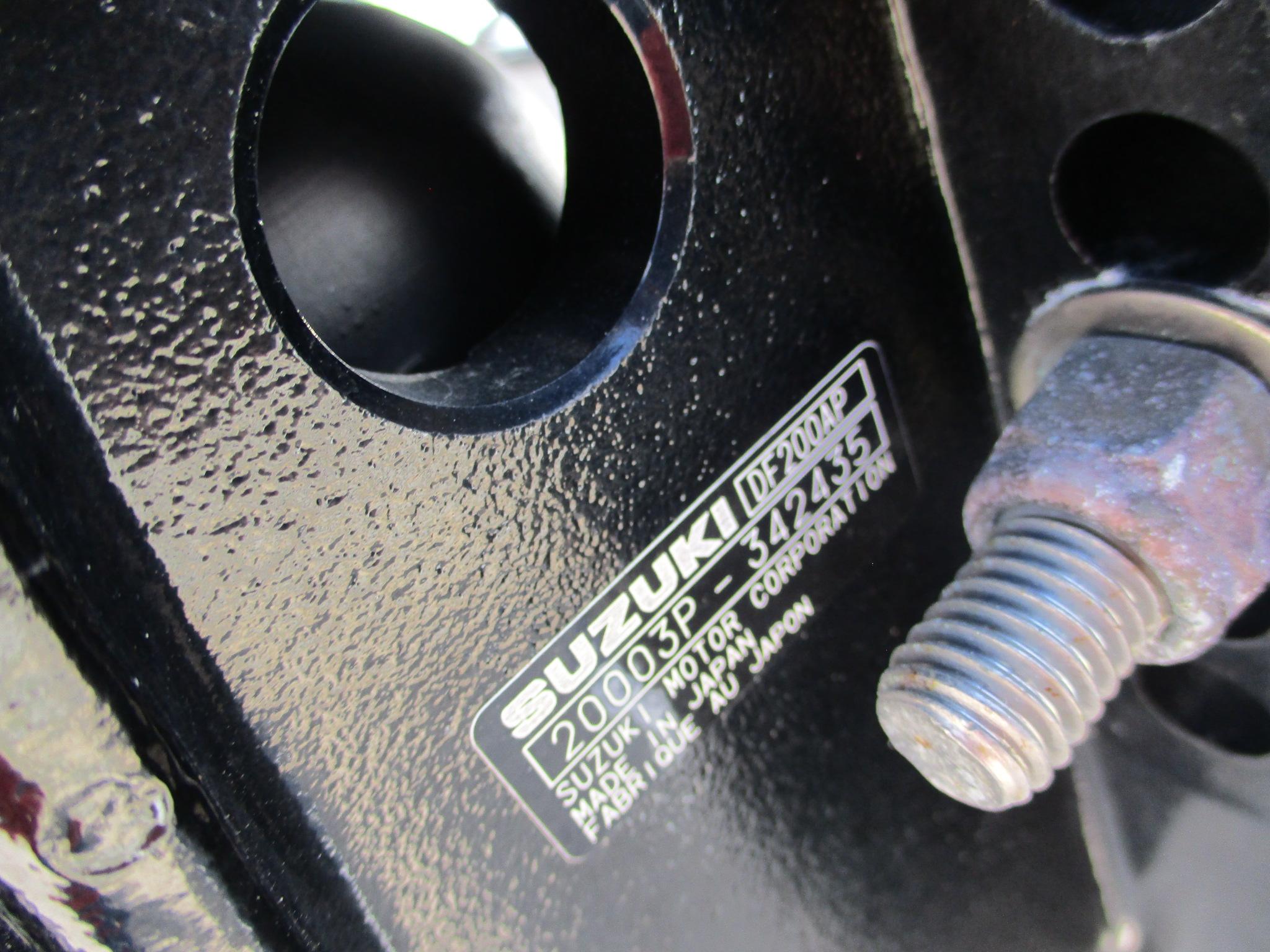 Close-up of Suzuki motor label on 2024 Blue Wave 2800 Makaira boat.