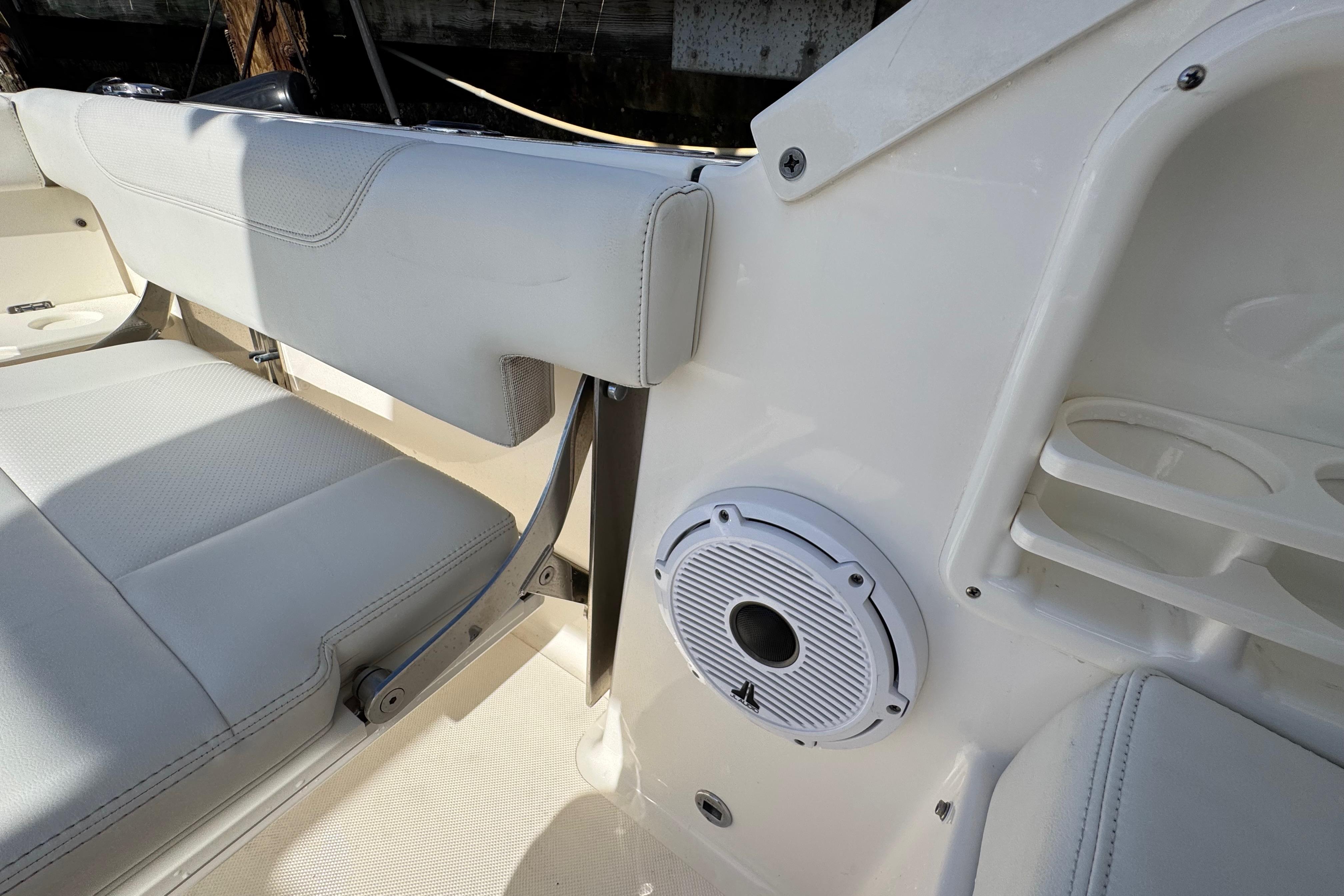 2022 Pursuit DC 266 Dual Console interior with seating and speaker detail.