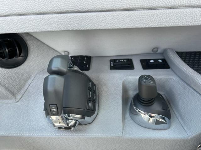 Control panel of a 2020 Cobalt A36BR boat with throttle and joystick.