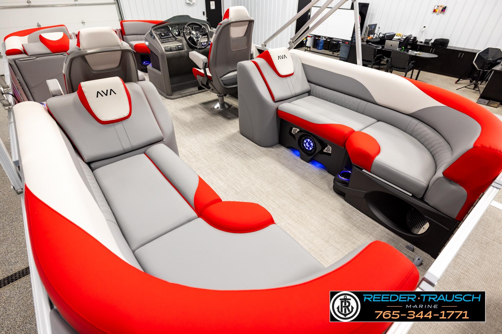 Luxurious 2026 Avalon LSZ QL pontoon boat interior with red and gray seating.