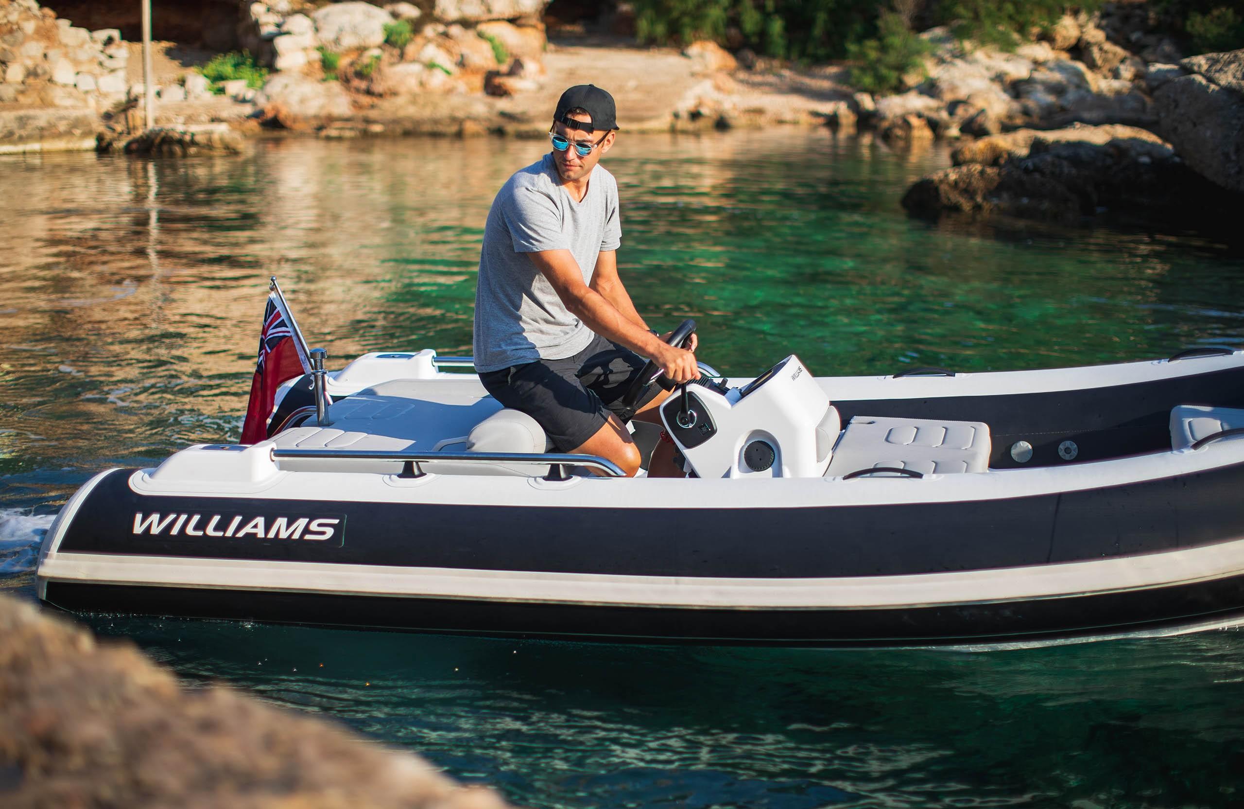 2025 Williams Jet Tenders Sportjet 435 cruising in clear waters.