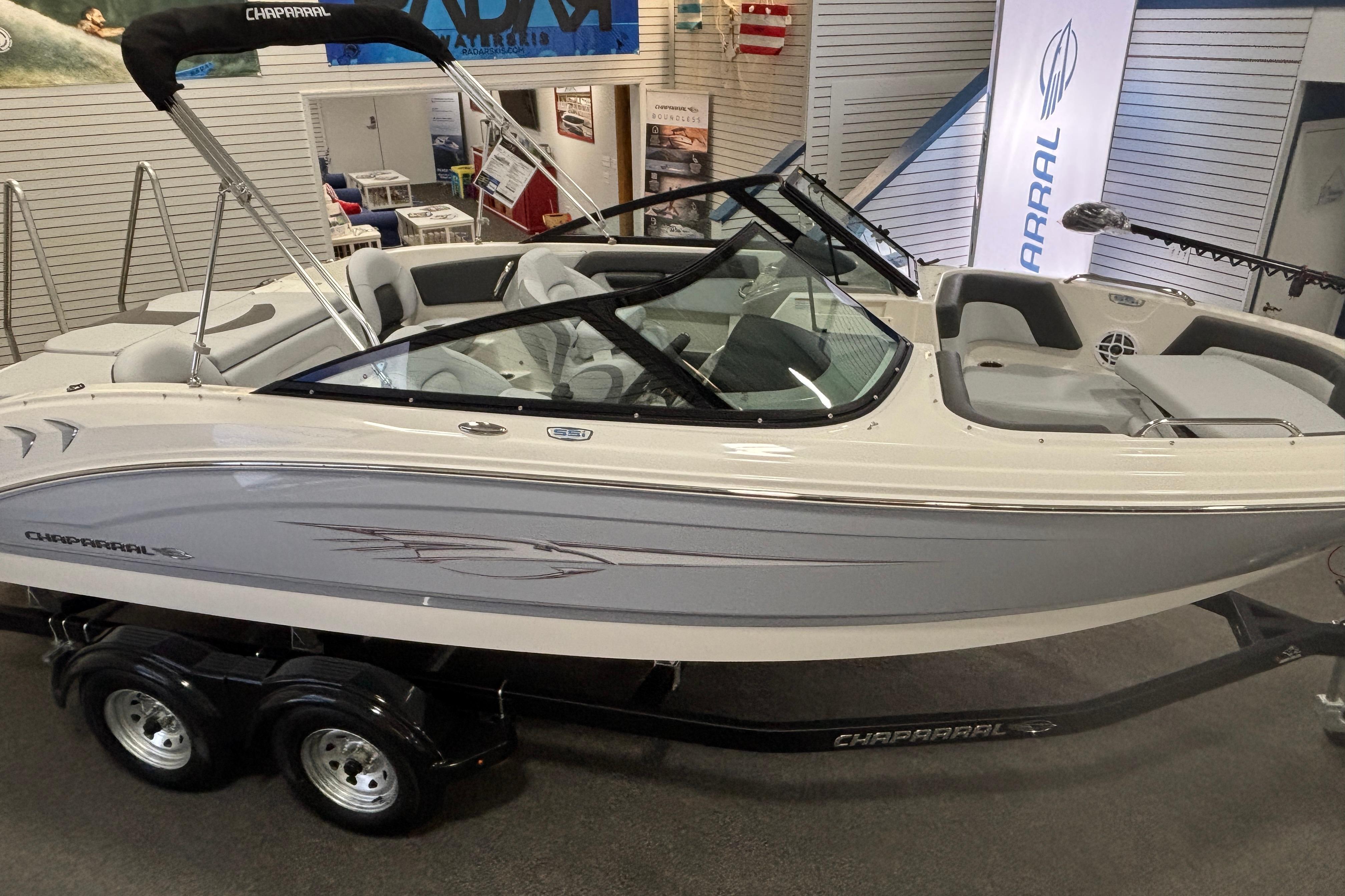 2026 Chaparral 21 SSi Ski & Fish boat in showroom.