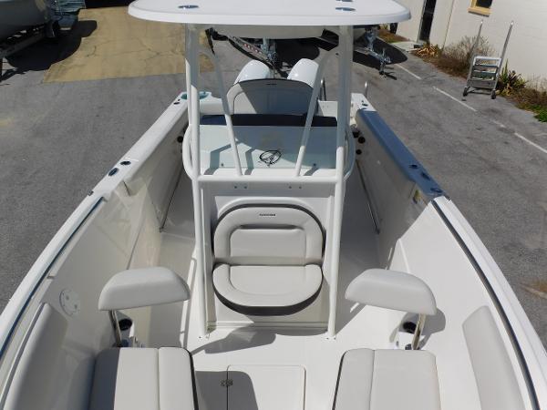 2024 Sailfish 242 CC center console boat with seating and storage compartments.