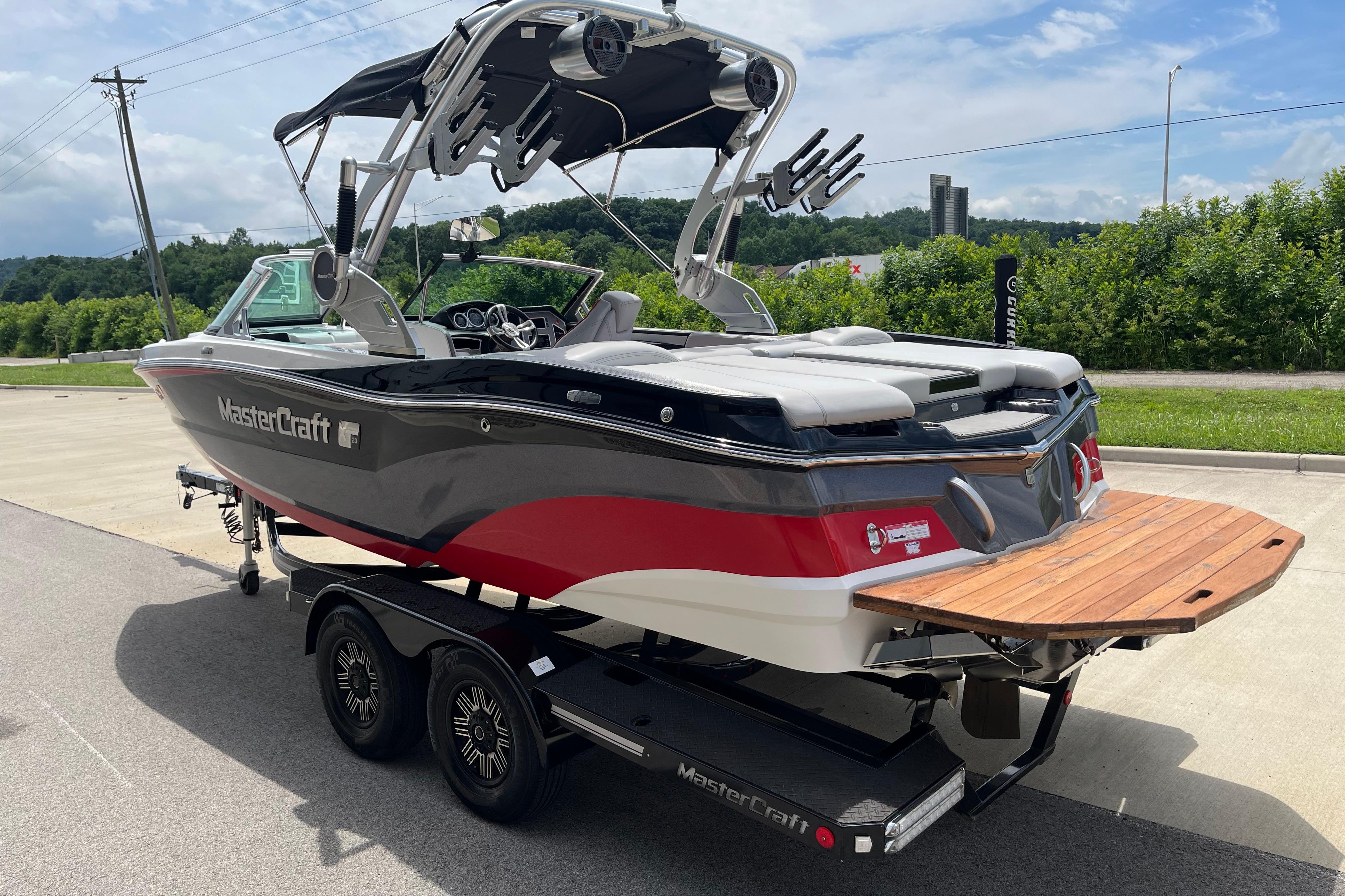 2019 MasterCraft XT20 boat on trailer, featuring sleek design and vibrant colors.