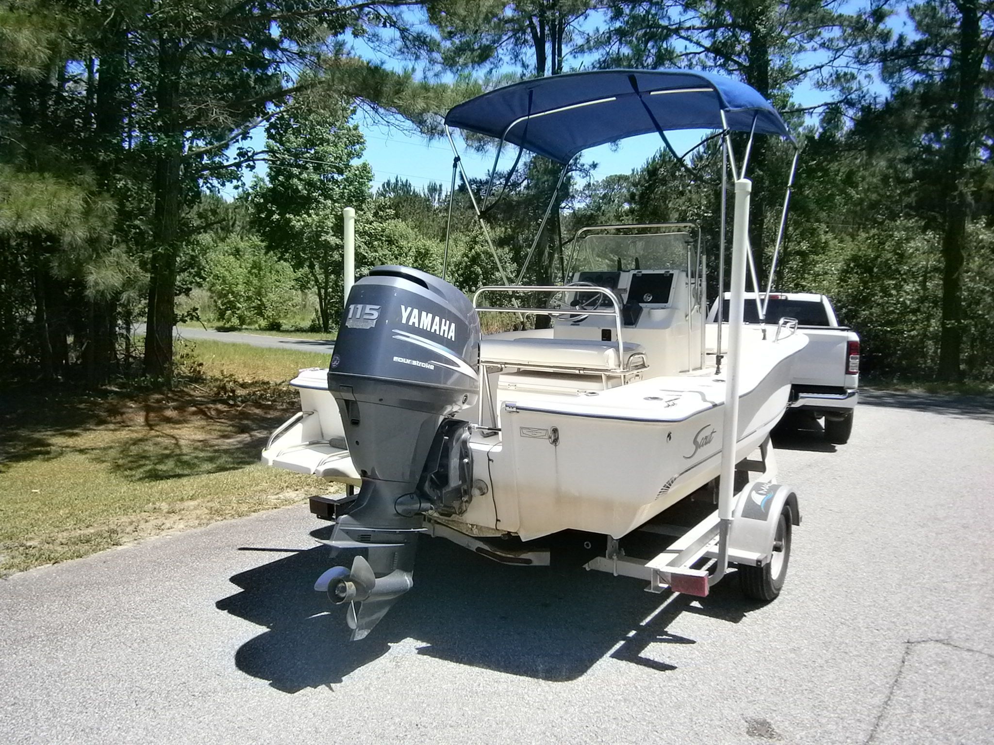 2004 Scout 175 Sportfish boat with Yamaha motor on trailer.