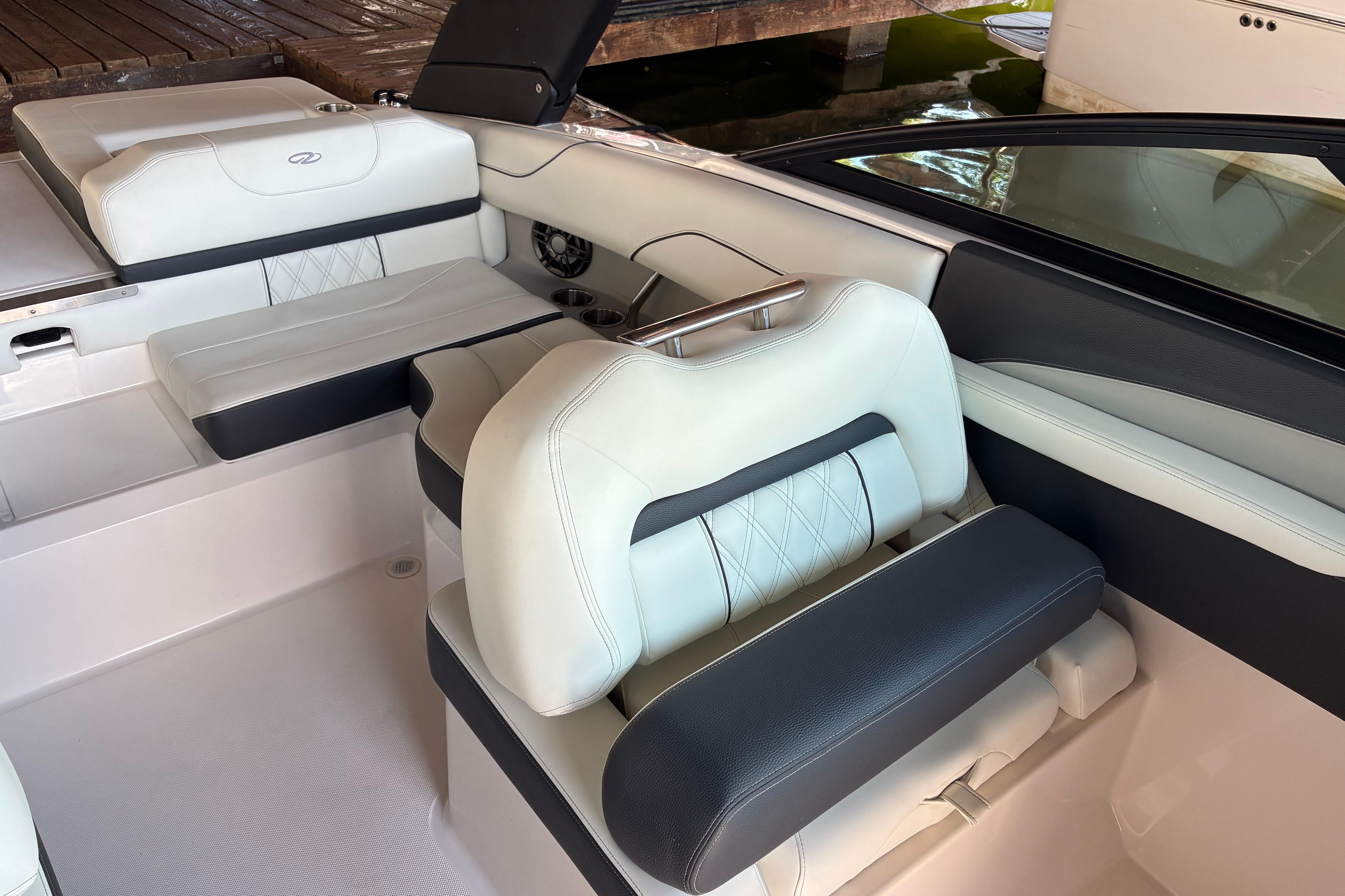 2025 Regal LS2 boat interior with luxurious white and black seating.