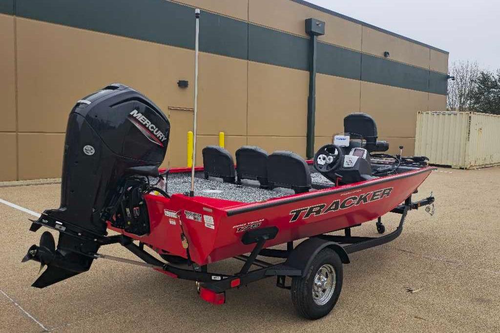 2026 Tracker Pro Team 175 Crappie Edition boat with Mercury engine, parked outdoors.