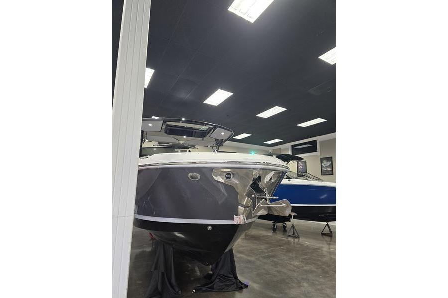 2026 Cobalt R31 boat displayed indoors under bright lighting.