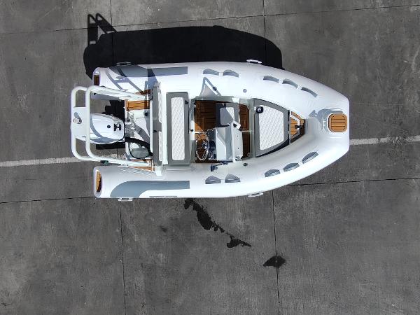 Aerial view of 2025 Tide Craft San Juan 11 boat on concrete surface.