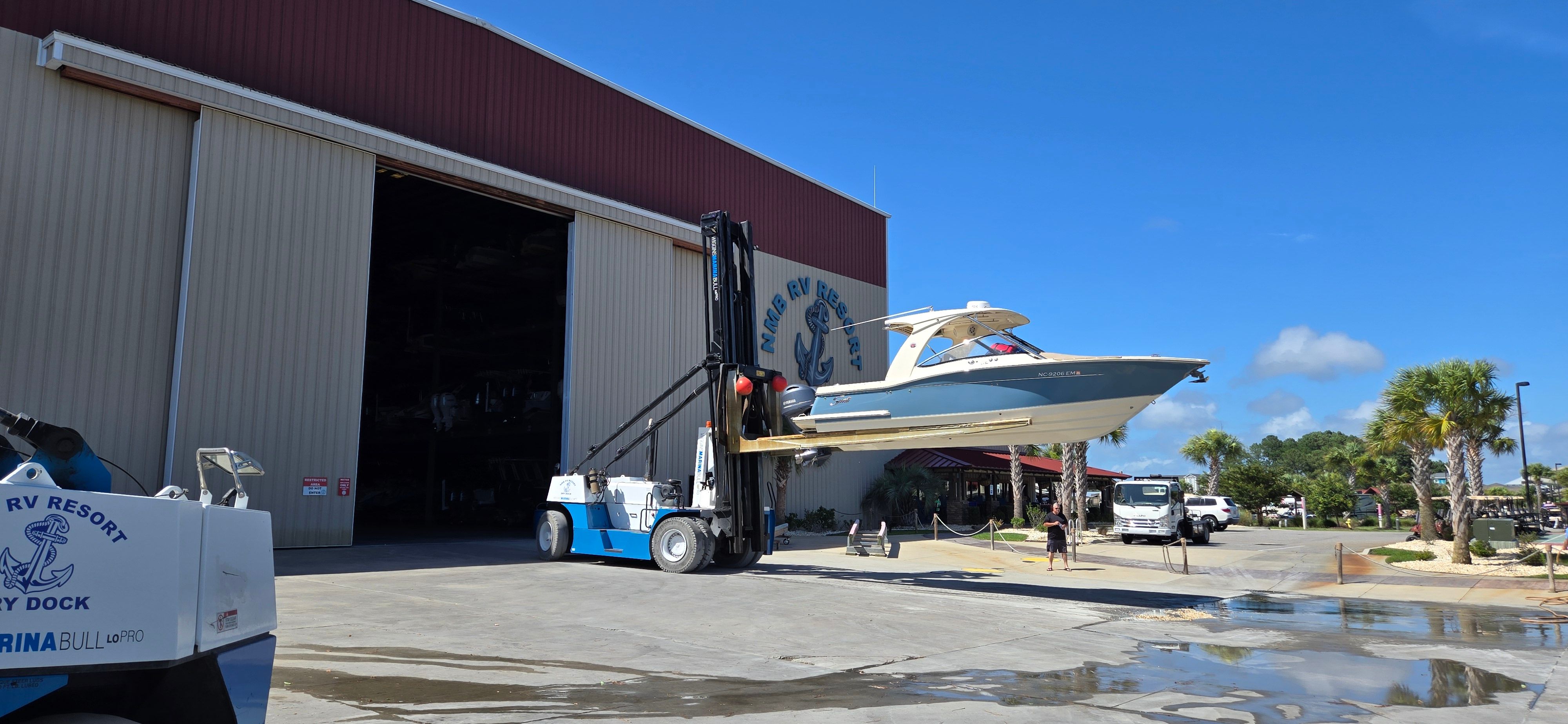 2019 Scout 275 Dorado boat being moved by forklift.