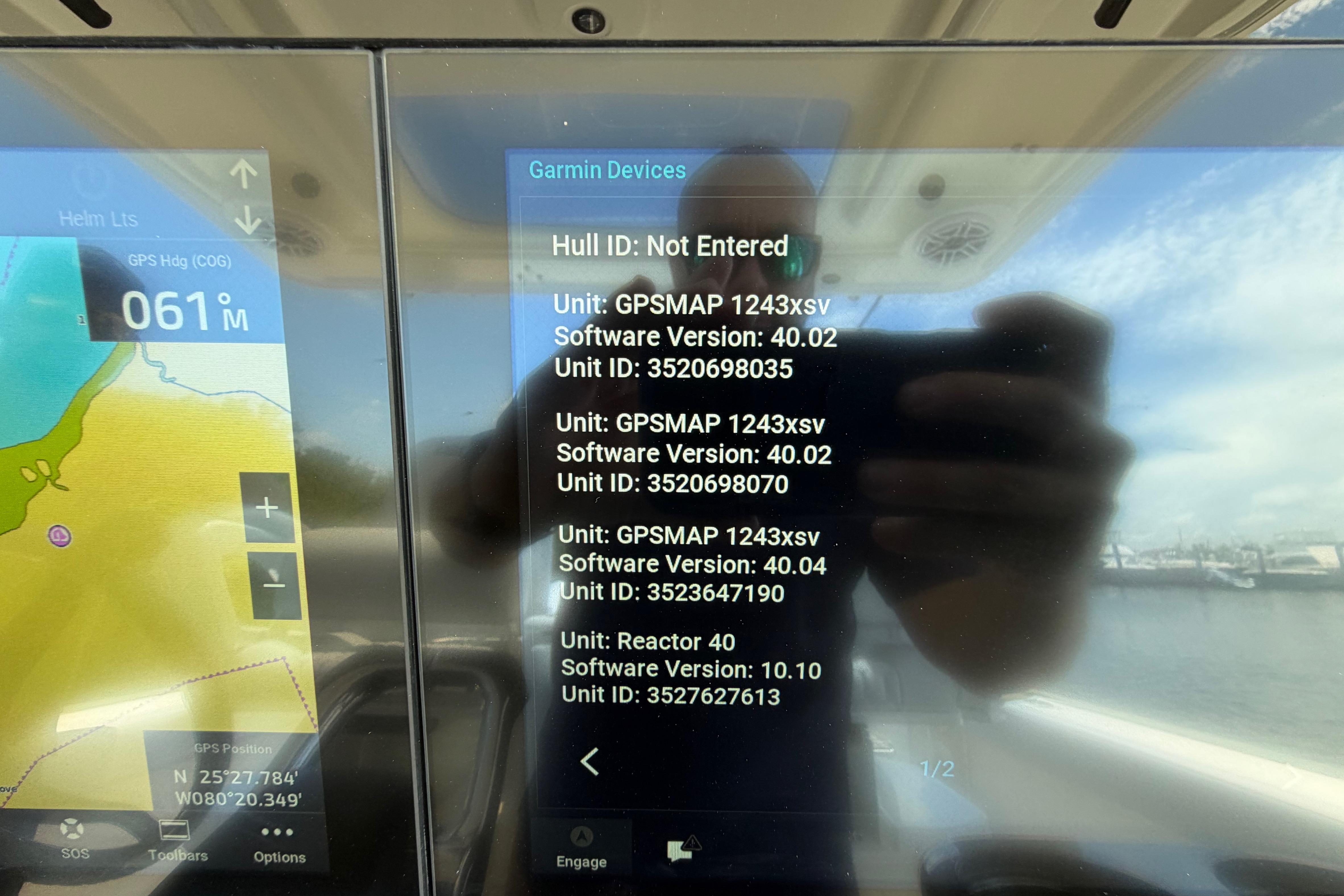 Garmin device screen on 2009 Everglades 350LX boat displaying GPS and software details.