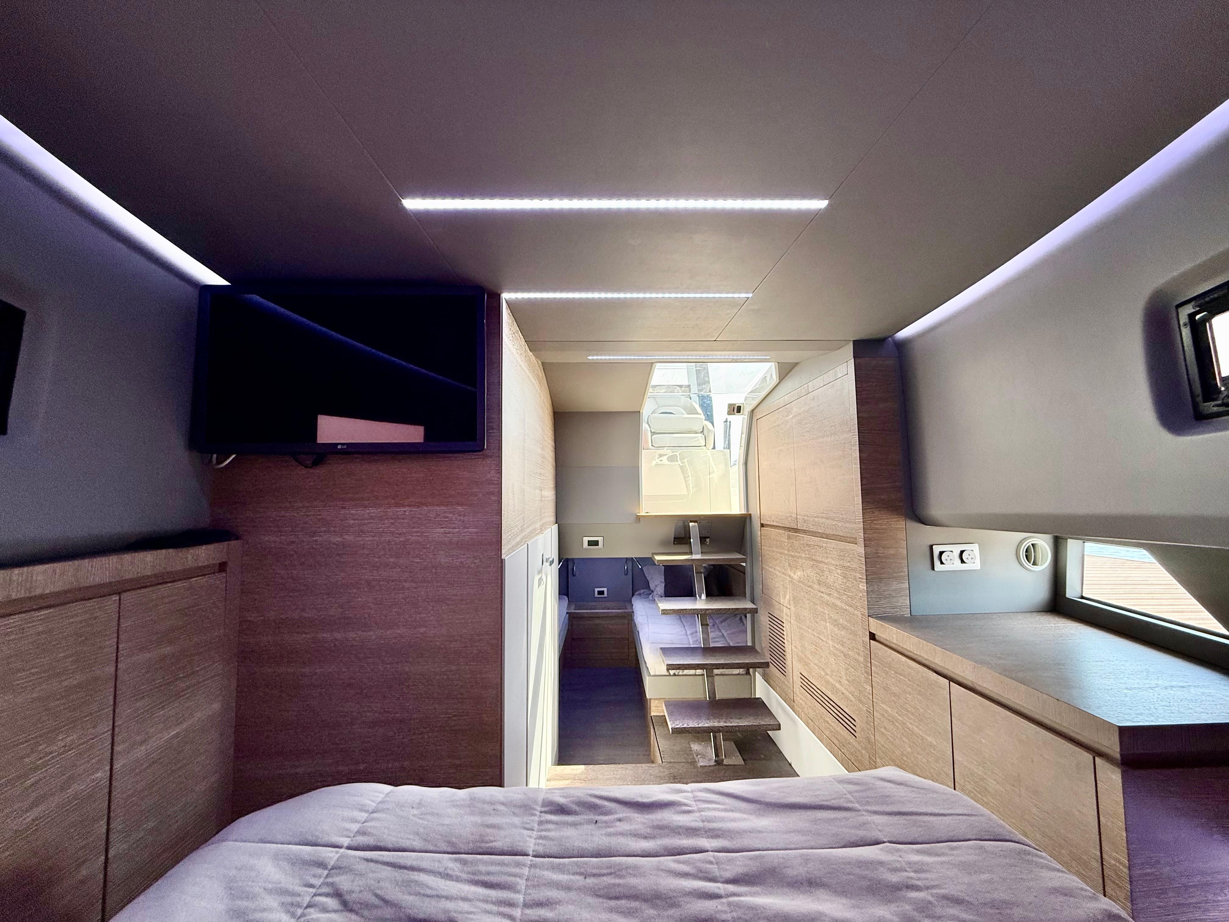 Luxurious interior of 2023 Astondoa 377 Coupe Outboard yacht with modern wood finishes.