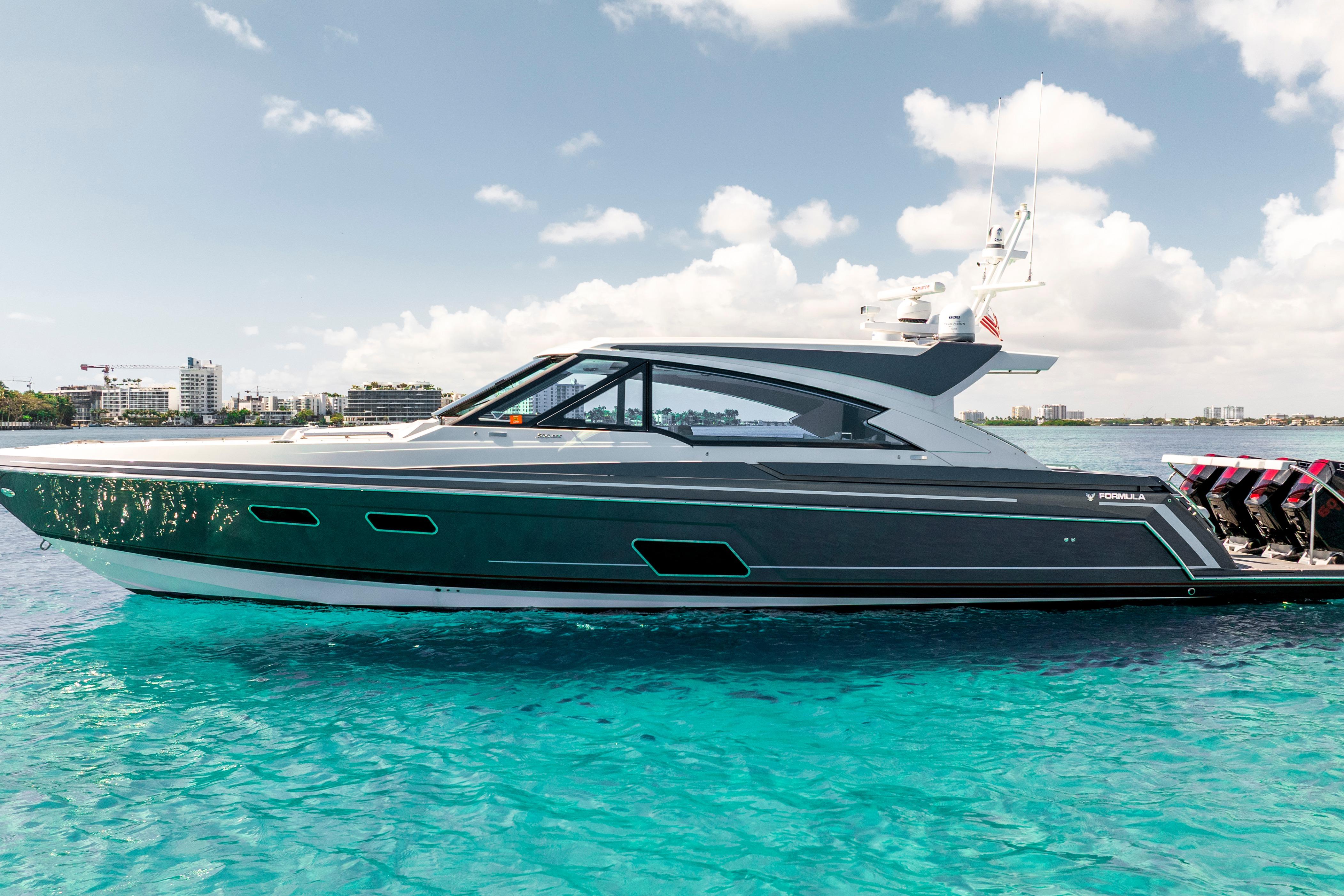 2022 Formula 500 Super Sport Crossover yacht on clear blue water.