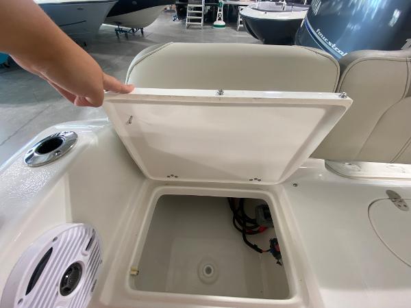 2024 Key West 189 FS boat storage compartment with open lid.