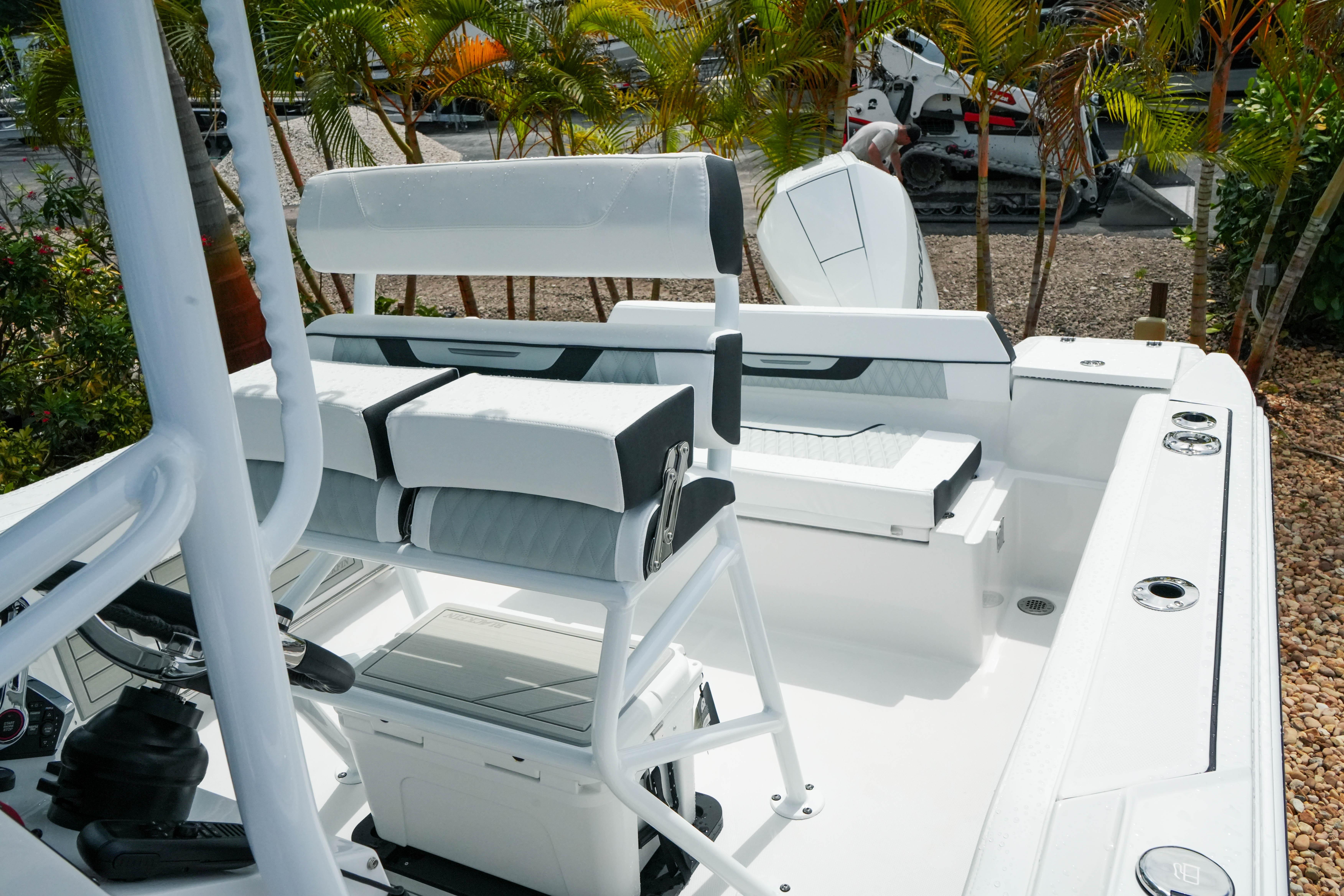 2026 Blackfin 222 CC boat interior with white seating and modern design.