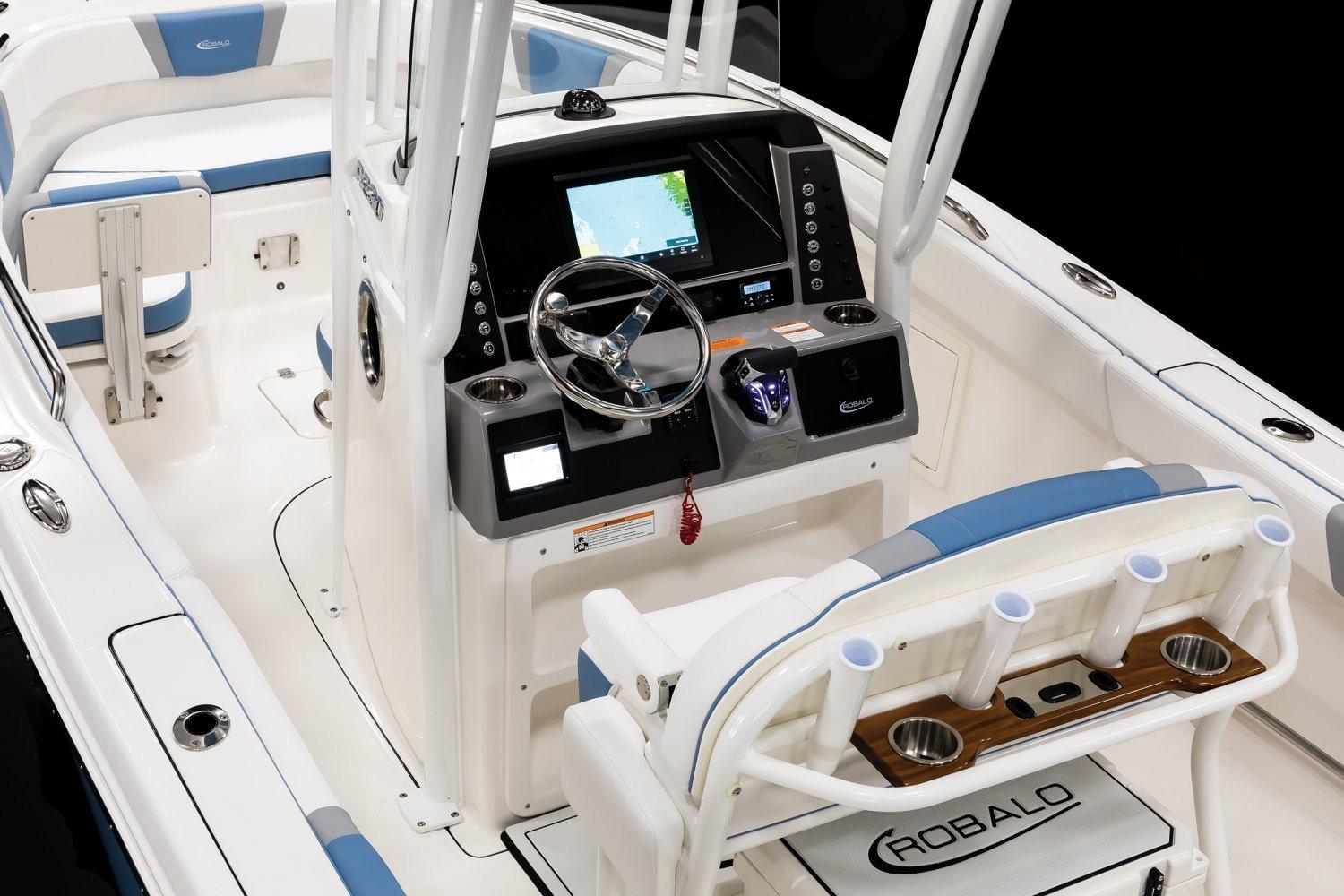 Manufacturer Provided Image: 2026 Robalo R230 Center Console boat interior with modern dashboard and seating.