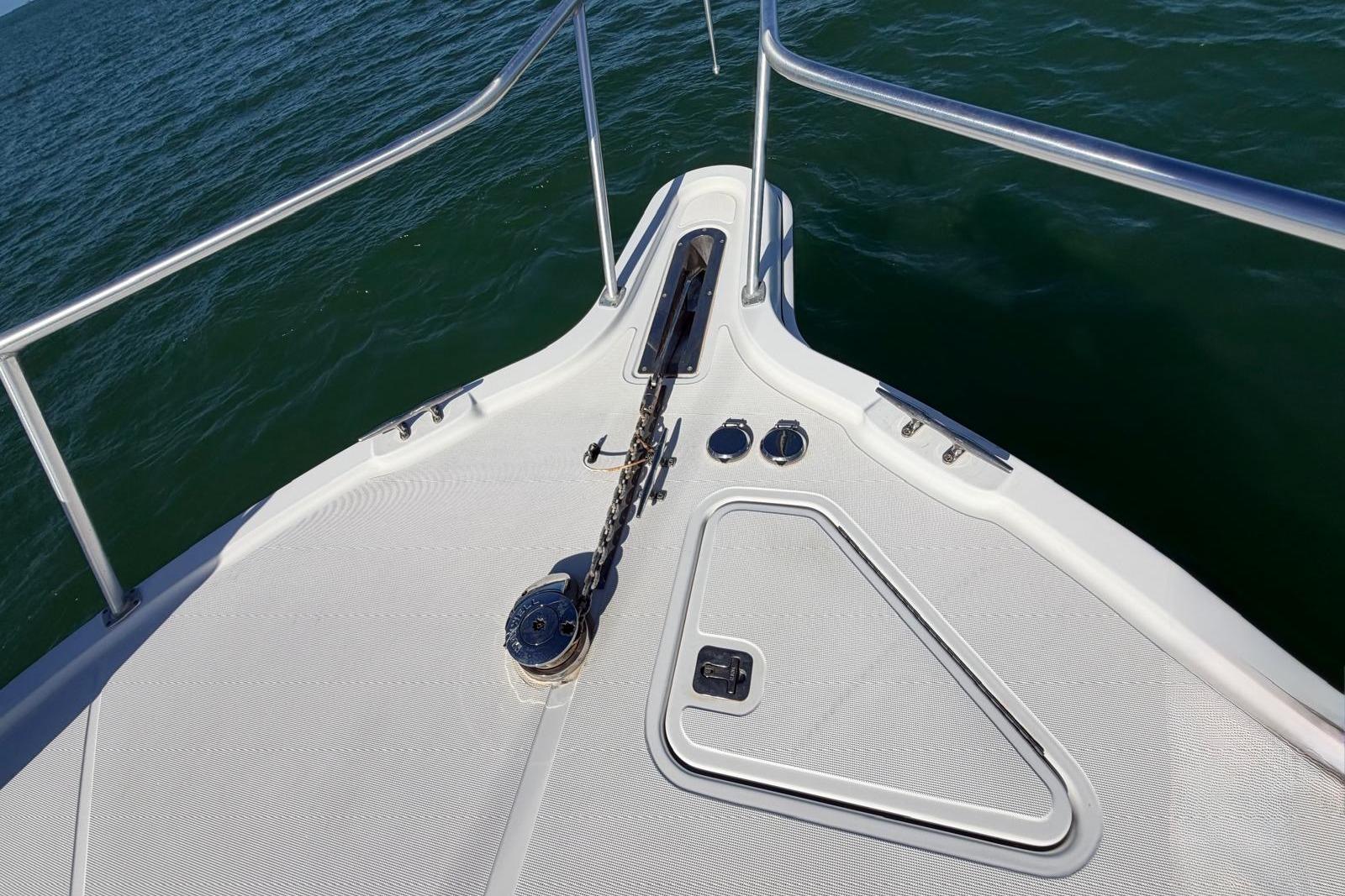 Bow of 2007 Tiara Yachts 3900 Convertible on open water.
