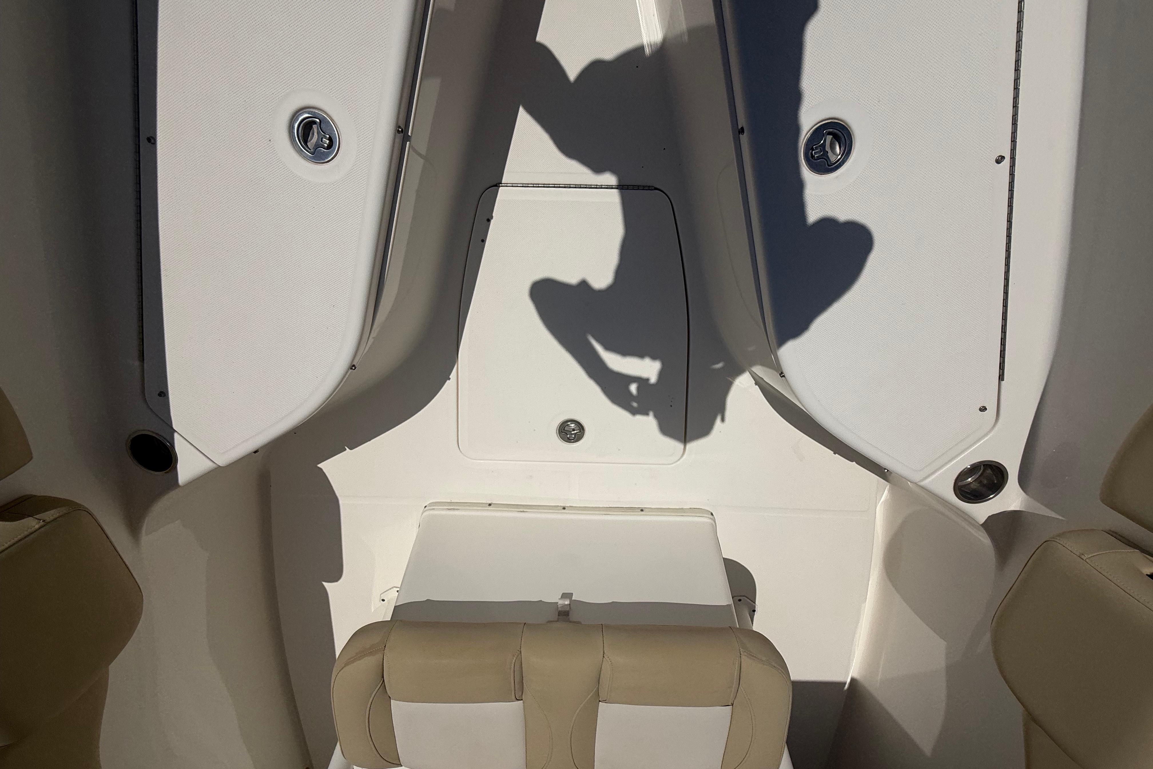 2019 Key West Billistic 281 Center Console interior with seating and storage compartments.