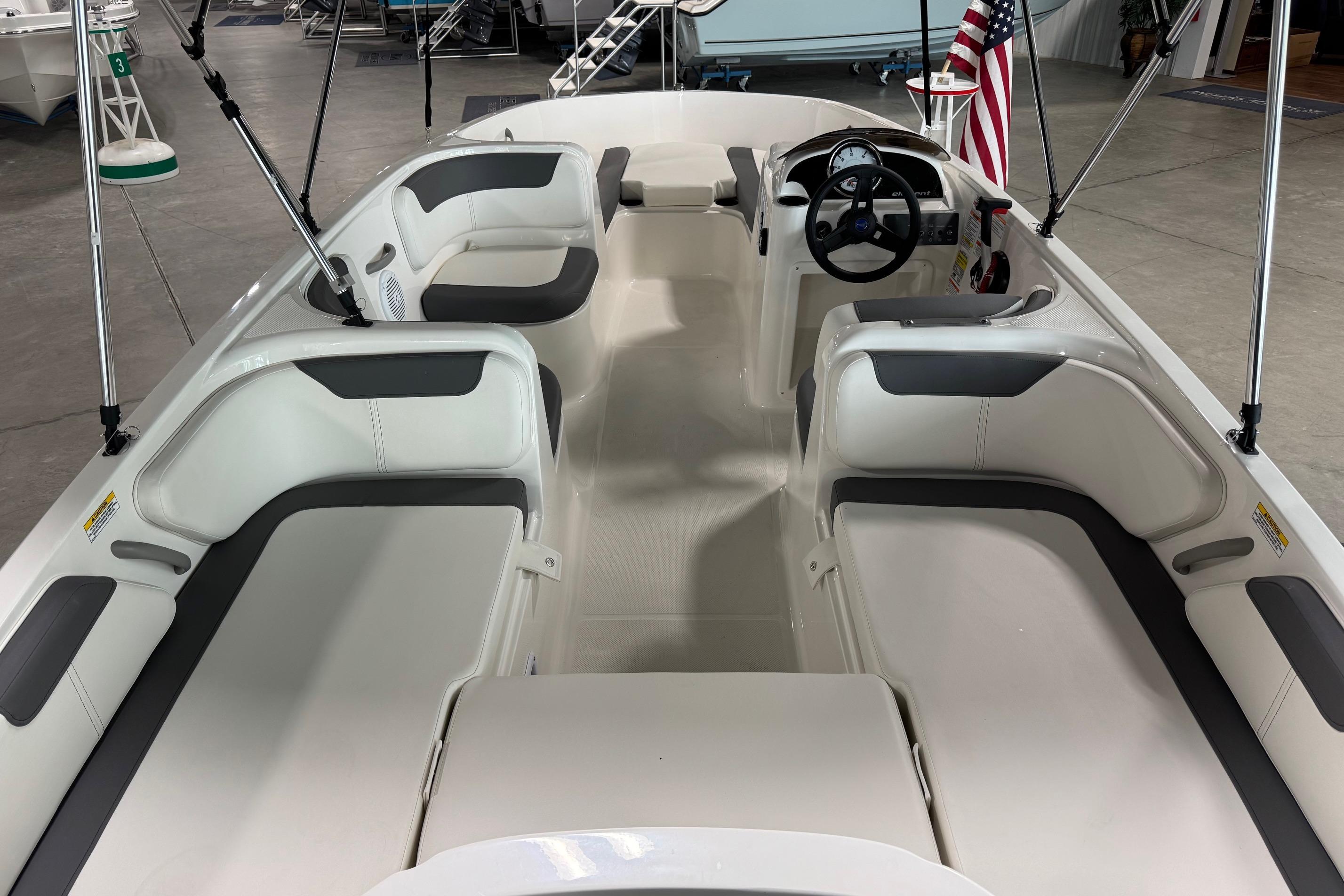 2026 Bayliner Element E18 boat interior with spacious seating and modern design.