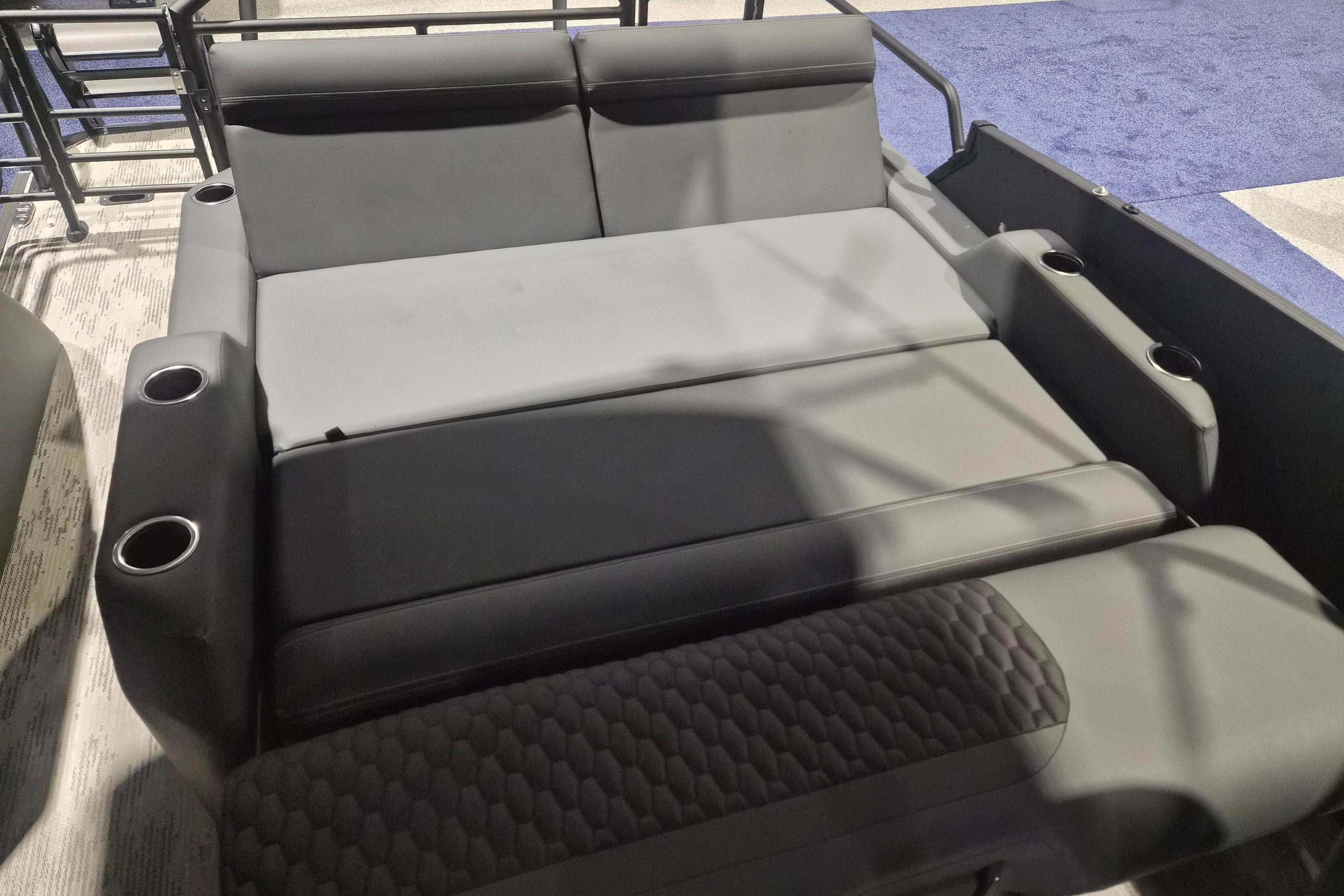 2026 Sylvan L3 ULZ boat seating with cup holders, featuring sleek gray upholstery.