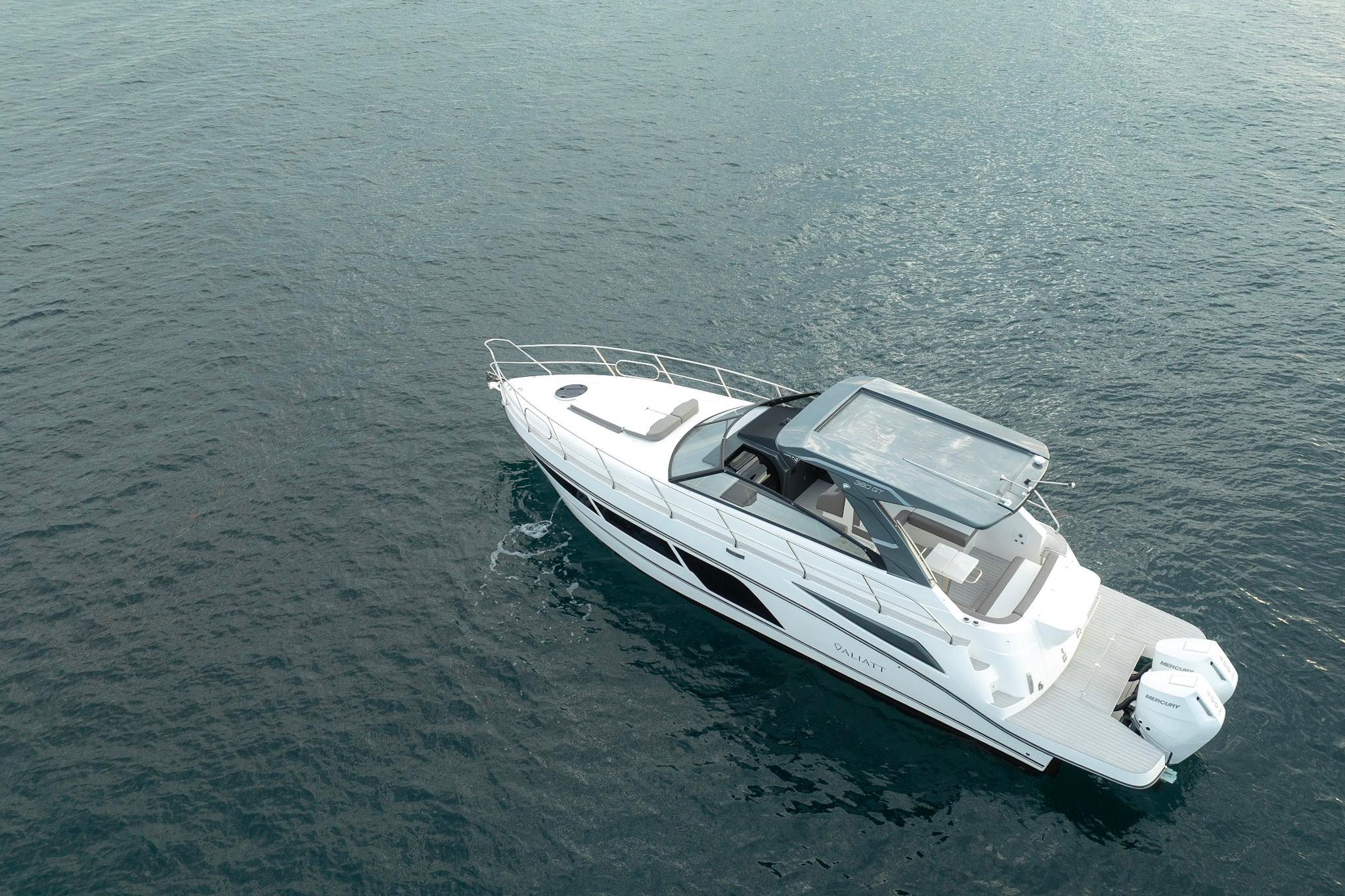 Aerial view of 2025 Valiatt 380GT luxury boat cruising on open water.