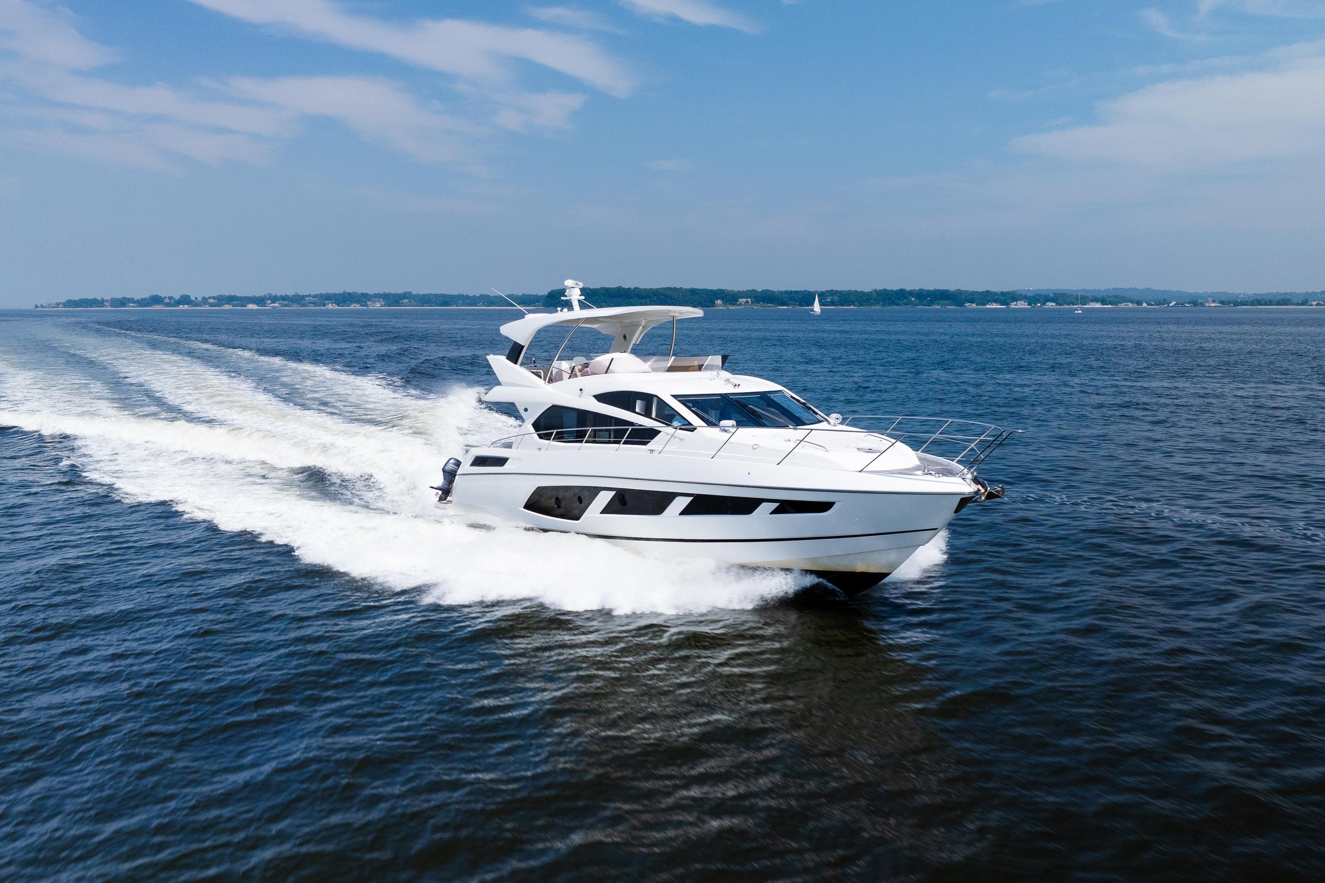 2016 Sunseeker Manhattan 65 yacht cruising on open water under clear skies.