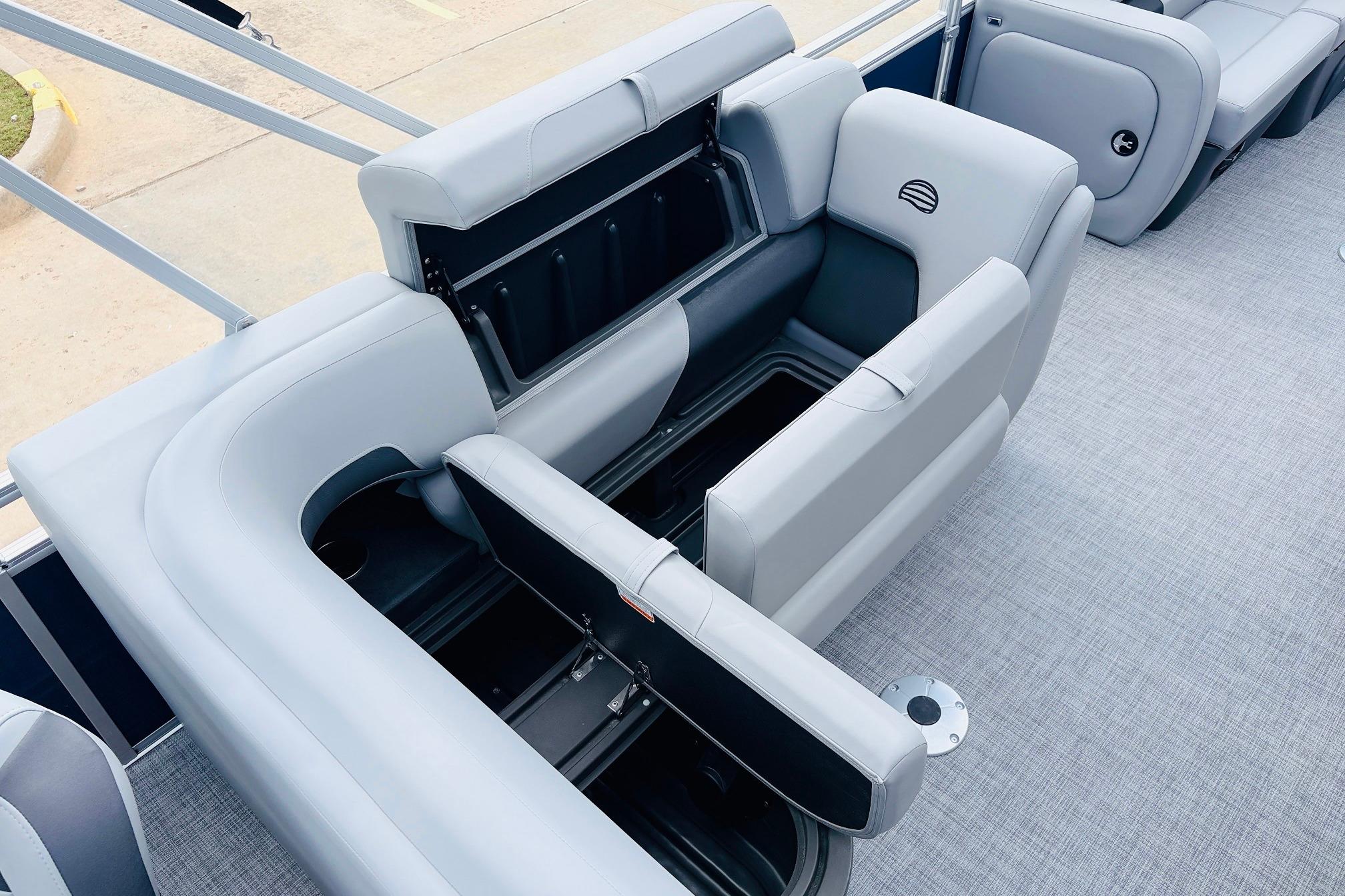 2026 Sun Tracker SportFish 22 DLX boat interior with open storage compartments.